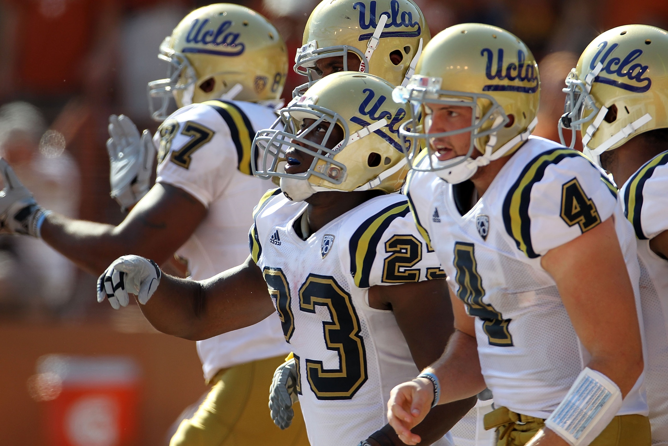 AUSTIN, TX - SEPTEMBER 25: Tailback Johnathan Franklin #23 of the UCLA Bruins runs off the field after scoring a touchdown in the third quarter against the Texas Longhorns at Darrell K Royal-Texas Memorial Stadium on September 25, 2010 in Austin, Texas. AUSTIN, TX - SEPTEMBER 25: Tailback Johnathan Franklin #23 of the UCLA Bruins runs off the field after scoring a touchdown in the third quarter against the Texas Longhorns at Darrell K Royal-Texas Memorial Stadium on September 25, 2010 in Austin, Texas.