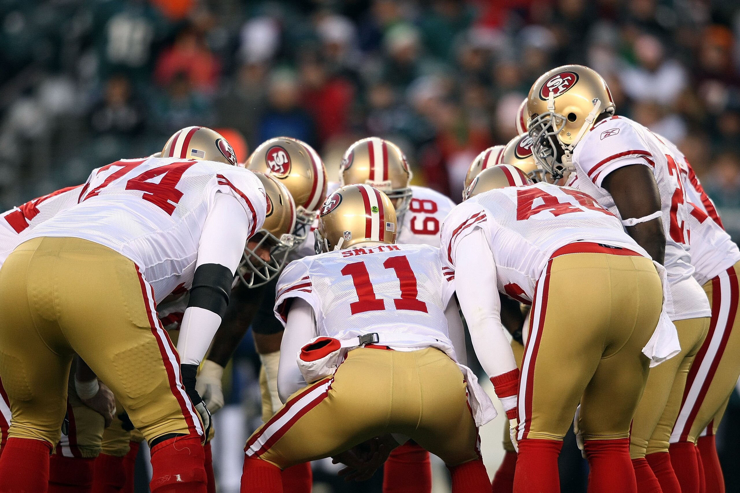 PHILADELPHIA - DECEMBER 20: Alex Smith #11 of the San Francisco 49ers talks to the huddle against the Philadelphia Eagles at Lincoln Financial Field on December 20, 2009 in Philadelphia, Pennsylvania. (Photo by Nick Laham/Getty Images) PHILADELPHIA - DECEMBER 20: Alex Smith #11 of the San Francisco 49ers talks to the huddle against the Philadelphia Eagles at Lincoln Financial Field on December 20, 2009 in Philadelphia, Pennsylvania. (Photo by Nick Laham/Getty Images)