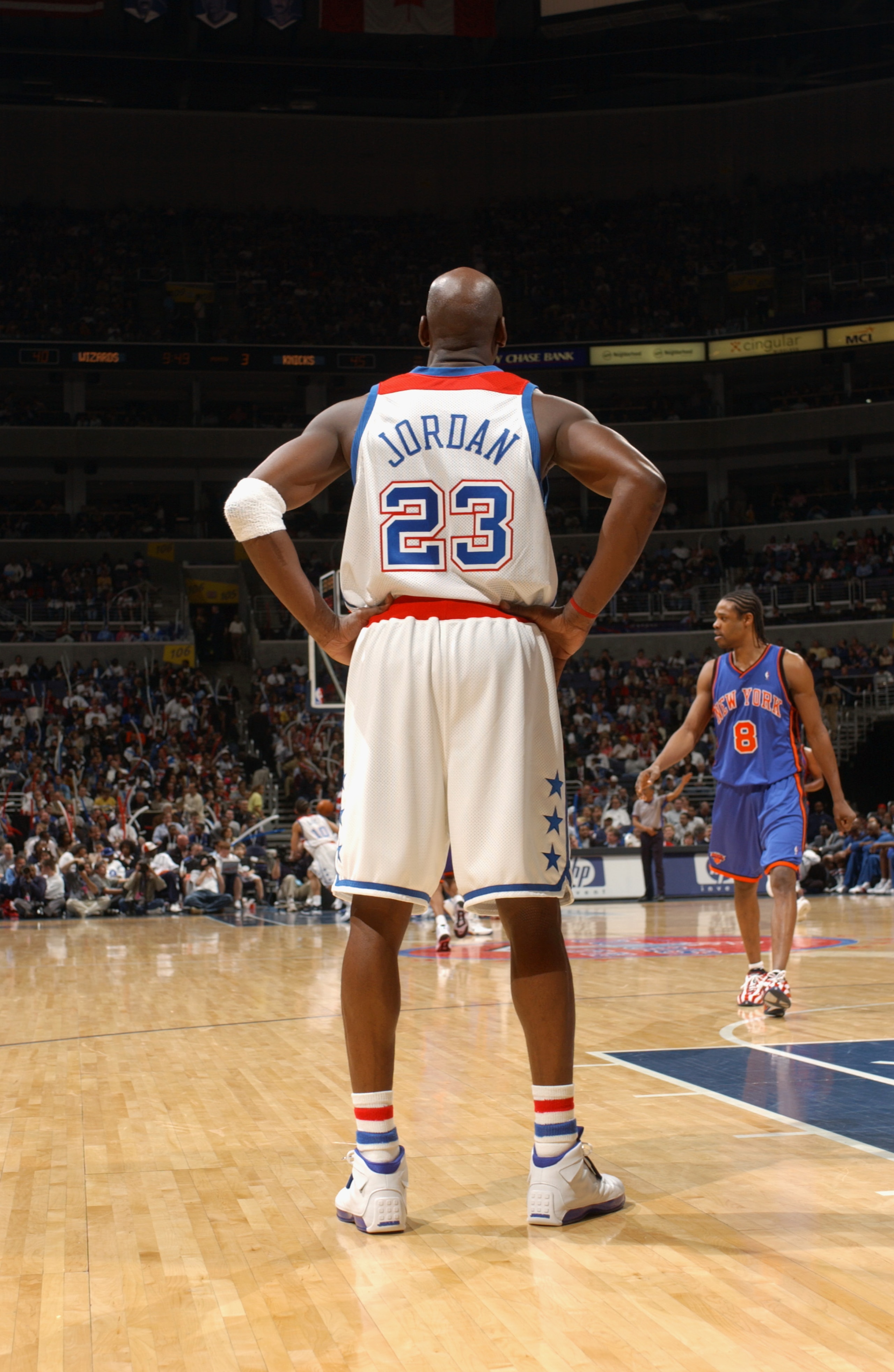 WASHINGTON - APRIL 14: Michael Jordan #23 of the Washington Wizards awaits play down court as the New York Knicks defeated the Wizards 93-79 in Jordan's final home game at MCI Center on April 14, 2003 in Washington, DC. NOTE TO USER: User expressly ack WASHINGTON - APRIL 14: Michael Jordan #23 of the Washington Wizards awaits play down court as the New York Knicks defeated the Wizards 93-79 in Jordan's final home game at MCI Center on April 14, 2003 in Washington, DC. NOTE TO USER: User expressly ack