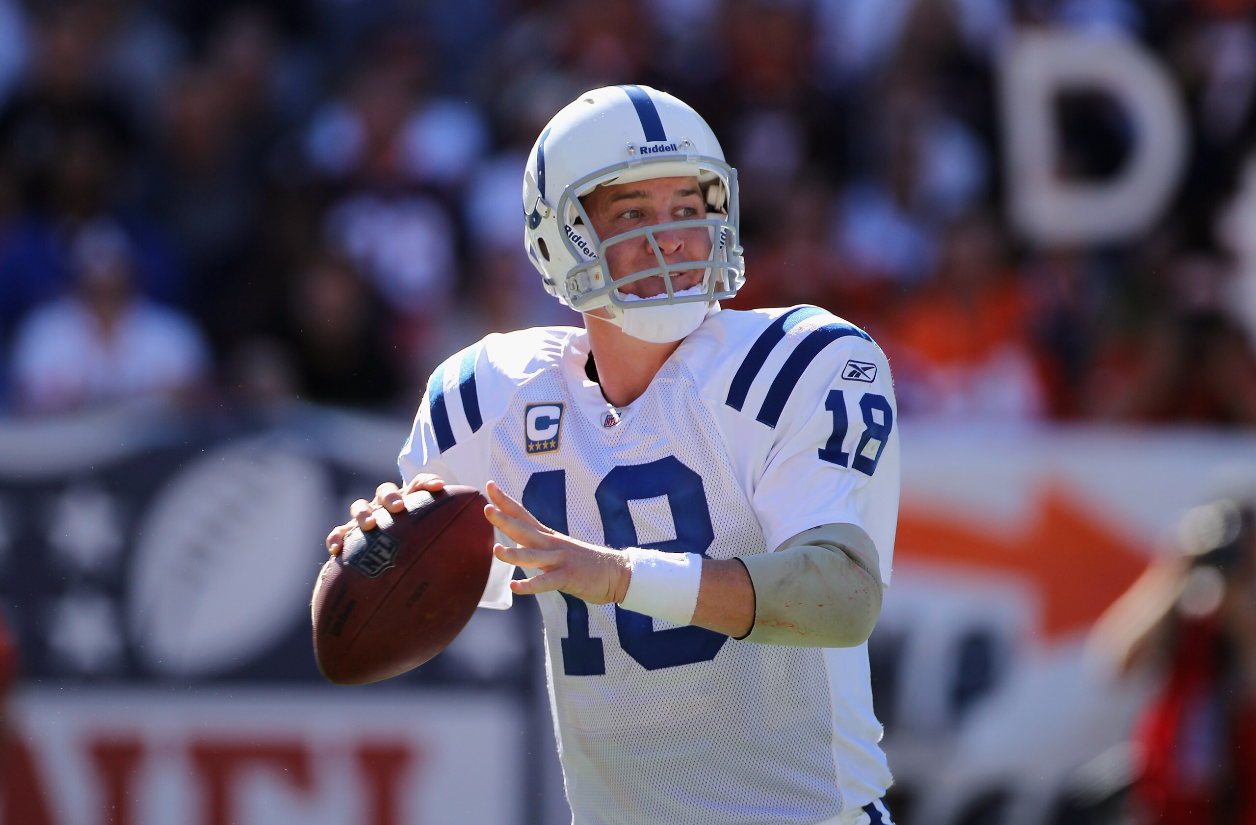 DENVER - SEPTEMBER 26:  Quarterback Peyton Manning #18 of the Indianapolis Colts drops back to pass against the Denver Broncos at INVESCO Field at Mile High on September 26, 2010 in Denver, Colorado.  (Photo by Doug Pensinger/Getty Images)