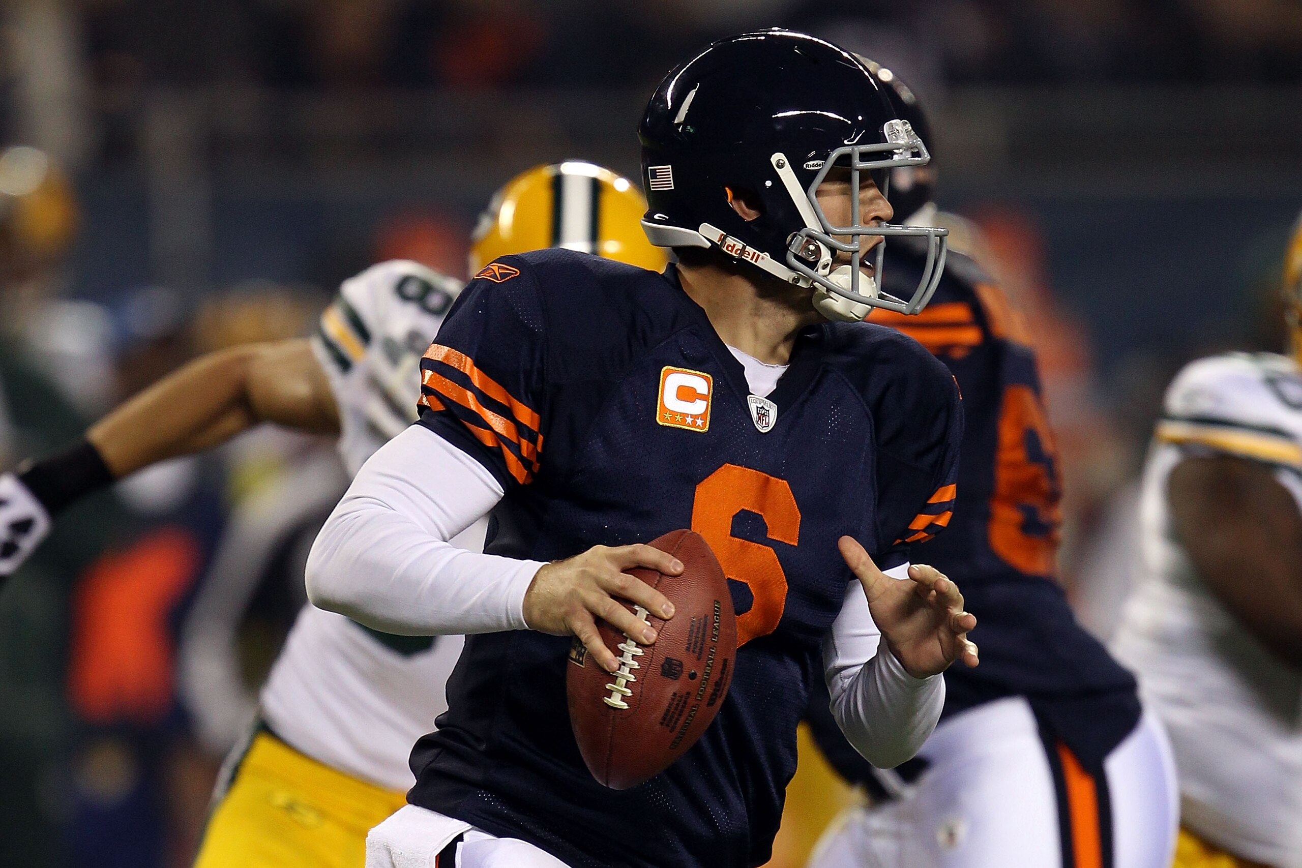 CHICAGO - SEPTEMBER 27: Jay Cutler #6 of the Chicago Bears rolls out to pass in the first quarter against the Green Bay Packers at Soldier Field on September 27, 2010 in Chicago, Illinois. (Photo by Jonathan Daniel/Getty Images) CHICAGO - SEPTEMBER 27: Jay Cutler #6 of the Chicago Bears rolls out to pass in the first quarter against the Green Bay Packers at Soldier Field on September 27, 2010 in Chicago, Illinois. (Photo by Jonathan Daniel/Getty Images)