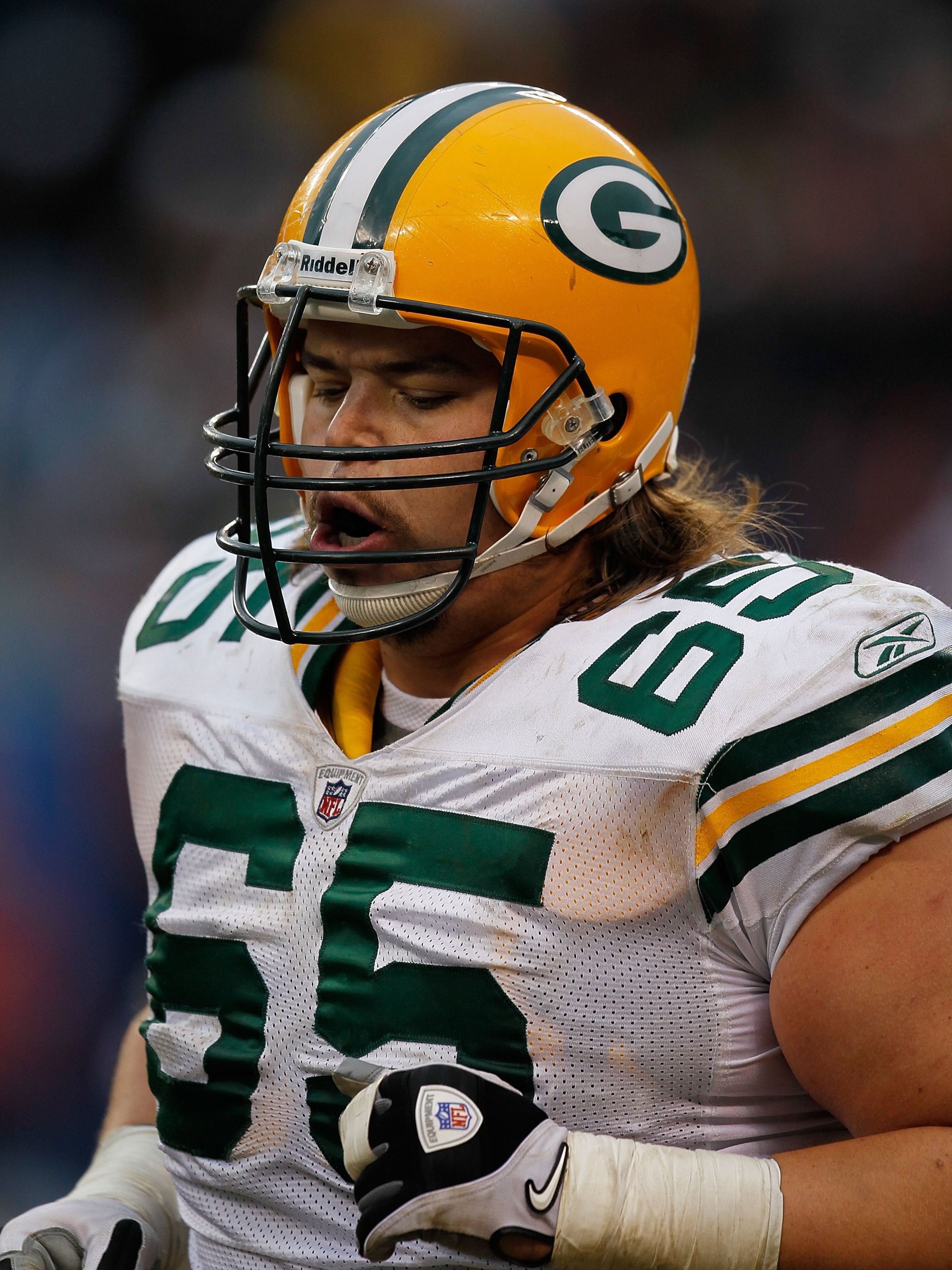 CHICAGO - DECEMBER 13: Mark Tauscher #65 of the Green Bay Packers runs off the field during a game against the Chicago Bears at Soldier Field on December 13, 2009 in Chicago, Illinois. The Packers defeated the Bears 21-14. (Photo by Jonathan Daniel/Getty CHICAGO - DECEMBER 13: Mark Tauscher #65 of the Green Bay Packers runs off the field during a game against the Chicago Bears at Soldier Field on December 13, 2009 in Chicago, Illinois. The Packers defeated the Bears 21-14. (Photo by Jonathan Daniel/Getty
