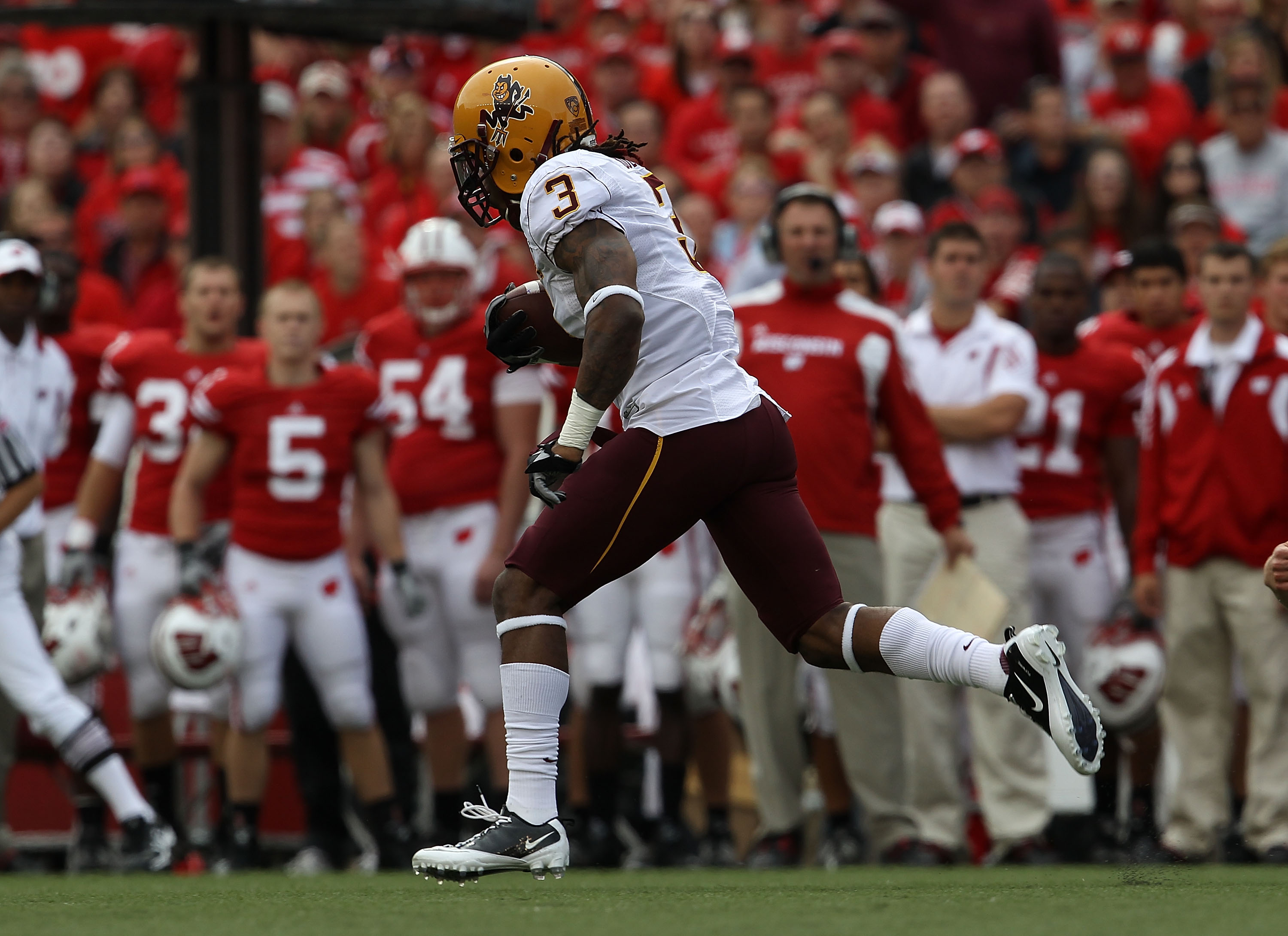 MADISON, WI - SEPTEMBER 18: Omar Bolden #3 of the Arizona State Sun Devils returns a kick-off for a touchdown against the Wisconsin Badgers at Camp Randall Stadium on September 18, 2010 in Madison, Wisconsin. (Photo by Jonathan Daniel/Getty Images) MADISON, WI - SEPTEMBER 18: Omar Bolden #3 of the Arizona State Sun Devils returns a kick-off for a touchdown against the Wisconsin Badgers at Camp Randall Stadium on September 18, 2010 in Madison, Wisconsin. (Photo by Jonathan Daniel/Getty Images)