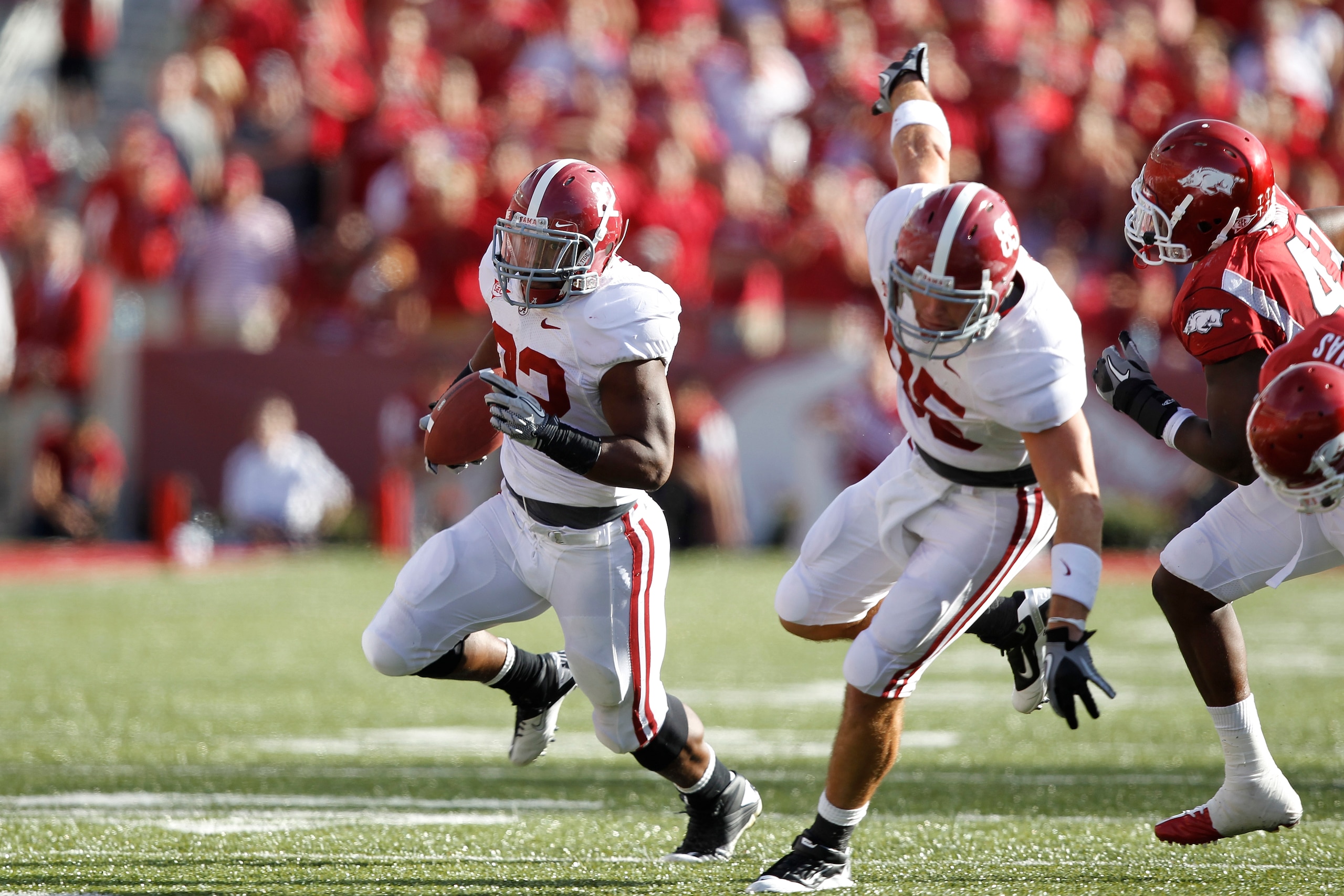 FAYETTEVILLE - SEPTEMBER 25: Mark Ingram #22 of the Alabama Crimson Tide runs the ball against the Arkansas Razorbacks at Donald W. Reynolds Razorback Stadium on September 25, 2010 in Fayetteville, Arkansas. Alabama won 24-20. (Photo by Joe Robbins/Getty
