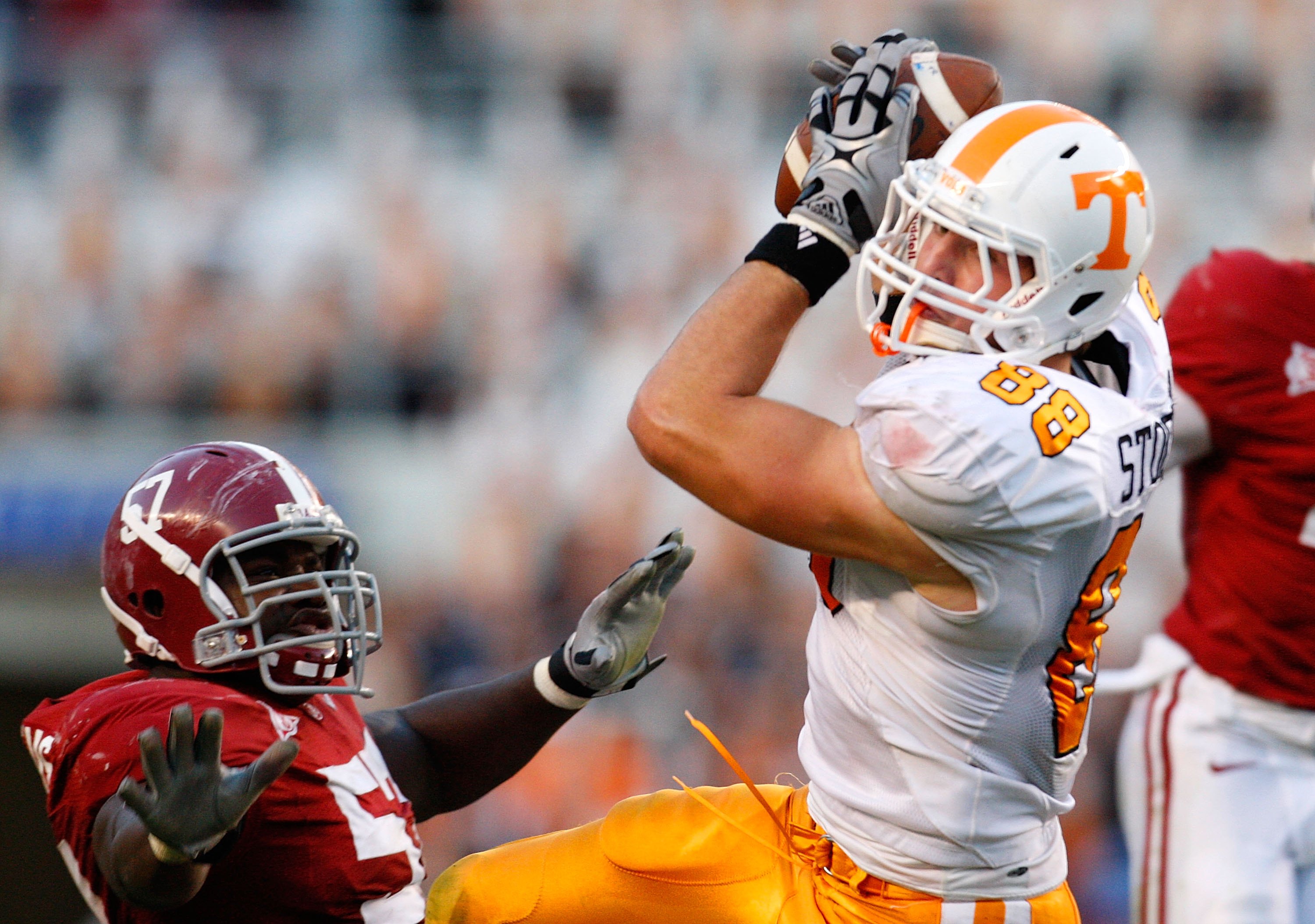 TUSCALOOSA, AL - OCTOBER 24: Luke Stocker #88 of the Tennessee Volunteers against Marcell Dareus #57 of the Alabama Crimson Tide at Bryant-Denny Stadium on October 24, 2009 in Tuscaloosa, Alabama. (Photo by Kevin C. Cox/Getty Images) TUSCALOOSA, AL - OCTOBER 24: Luke Stocker #88 of the Tennessee Volunteers against Marcell Dareus #57 of the Alabama Crimson Tide at Bryant-Denny Stadium on October 24, 2009 in Tuscaloosa, Alabama. (Photo by Kevin C. Cox/Getty Images)