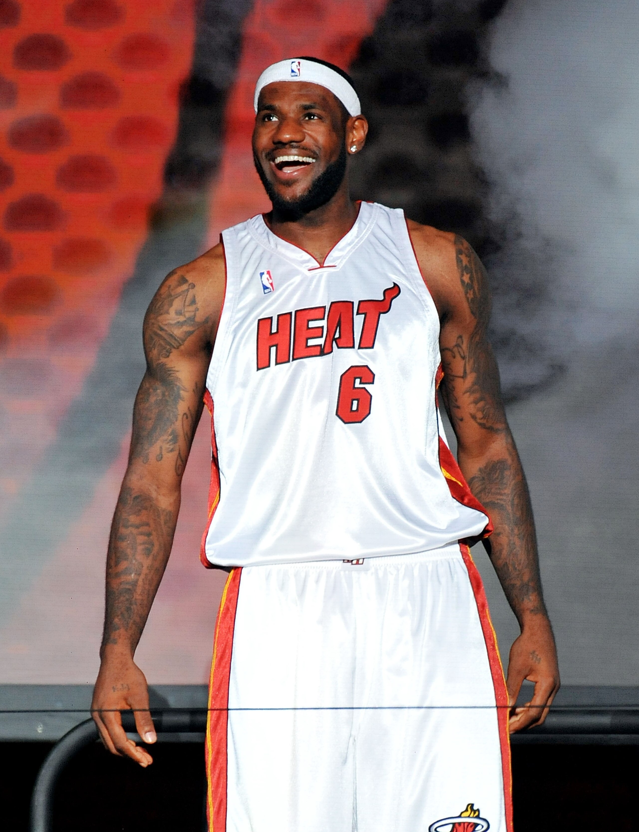 MIAMI - JULY 09:  LeBron James #6 of the Miami Heat greets fans as he is introduced during a welcome party at American Airlines Arena on July 9, 2010 in Miami, Florida.  (Photo by Doug Benc/Getty Images)