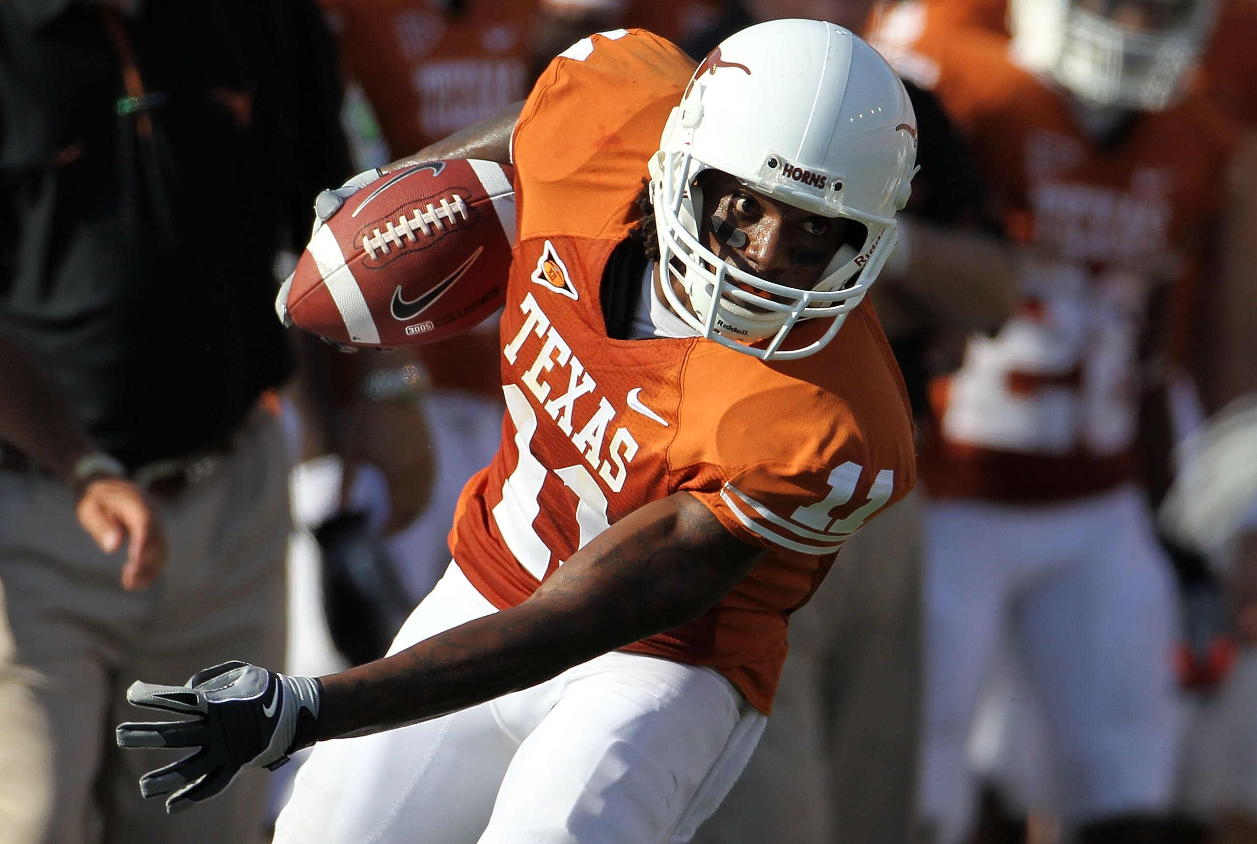 AUSTIN, TX - SEPTEMBER 25:  Wide receiver James Kirkendoll #11 of the Texas Longhorns runs the ball against the UCLA Bruins at Darrell K Royal-Texas Memorial Stadium on September 25, 2010 in Austin, Texas.  (Photo by Ronald Martinez/Getty Images)