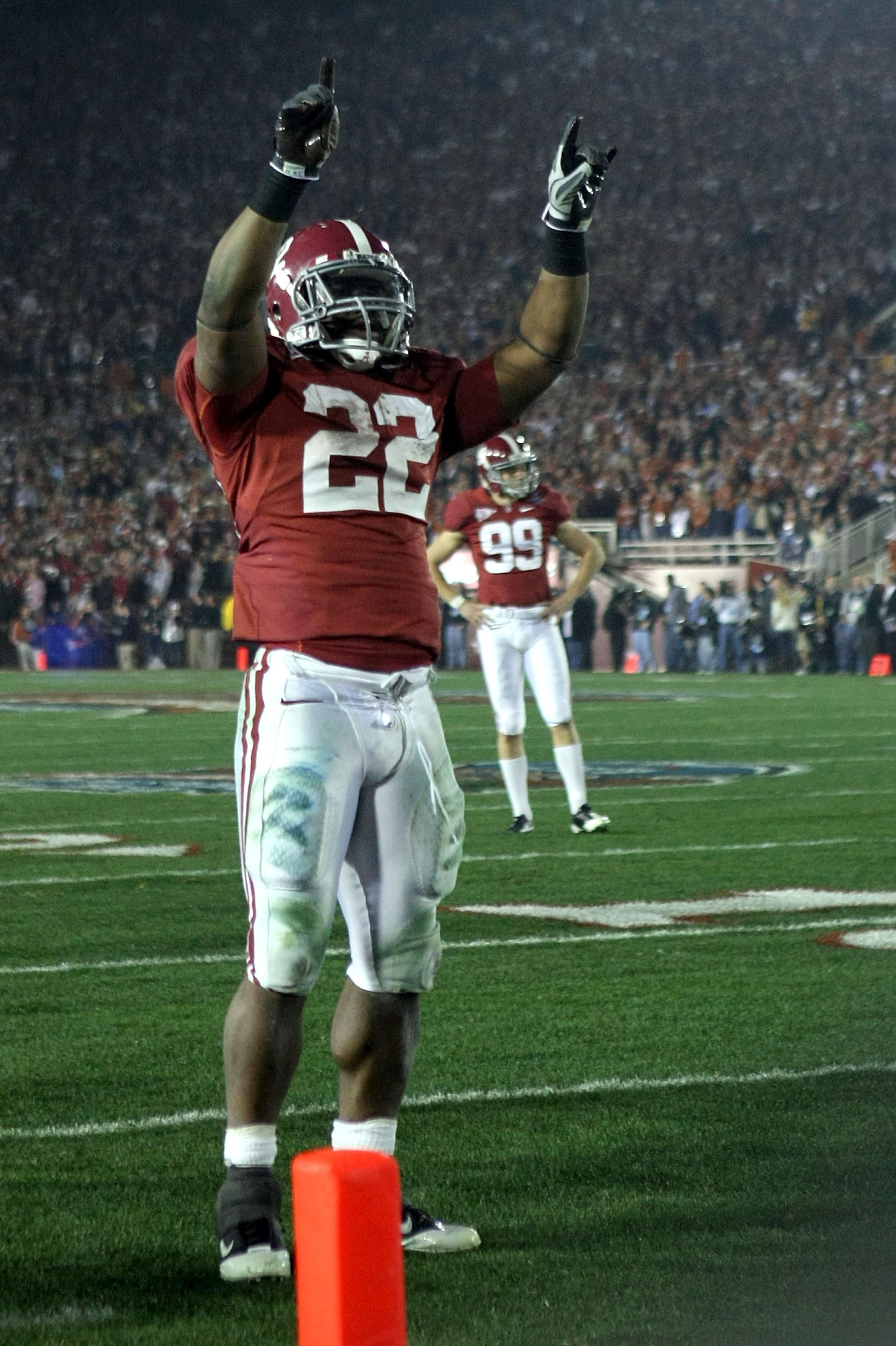 PASADENA, CA - JANUARY 07: Running back Mark Ingram #22 of the Alabama Crimson Tide celebrates after an extra point during the Citi BCS National Championship game against the Texas Longhorns at the Rose Bowl on January 7, 2010 in Pasadena, California. Th PASADENA, CA - JANUARY 07: Running back Mark Ingram #22 of the Alabama Crimson Tide celebrates after an extra point during the Citi BCS National Championship game against the Texas Longhorns at the Rose Bowl on January 7, 2010 in Pasadena, California. Th