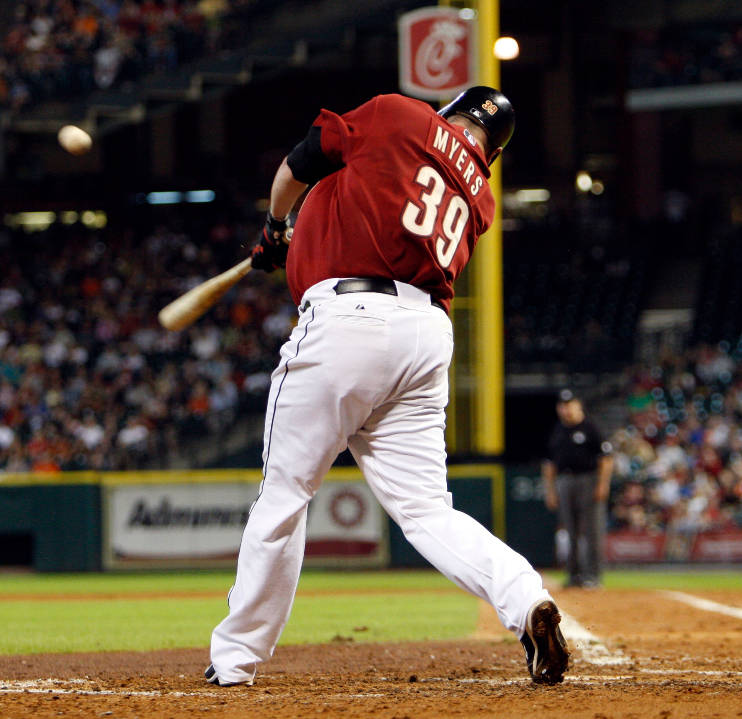 HOUSTON - SEPTEMBER 19:  Brett Myers #39 of the Houston Astros hits a sacrifice fly to center field against the Cincinnatti Reds scoring Humberto Quintero from third base at Minute Maid Park on September 19, 2010 in Houston, Texas.  (Photo by Bob Levey/Ge