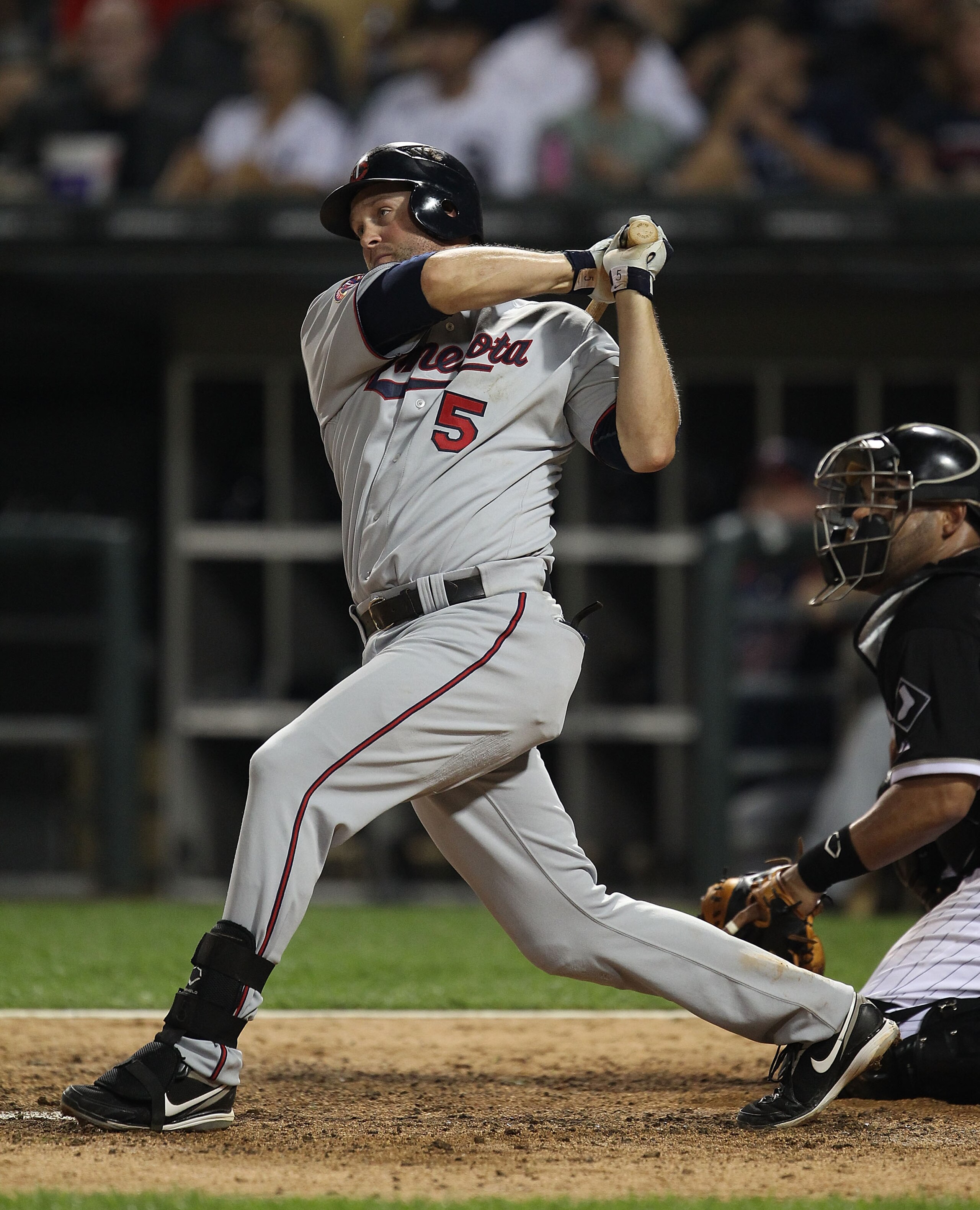 CHICAGO - AUGUST 10: Michael Cuddyer #5 of the Minnesota Twins takes a swing against the Chicago White Sox at U.S. Cellular Field on August 10, 2010 in Chicago, Illinois. The Twins defeated the White Sox 12-6. (Photo by Jonathan Daniel/Getty Images) CHICAGO - AUGUST 10: Michael Cuddyer #5 of the Minnesota Twins takes a swing against the Chicago White Sox at U.S. Cellular Field on August 10, 2010 in Chicago, Illinois. The Twins defeated the White Sox 12-6. (Photo by Jonathan Daniel/Getty Images)