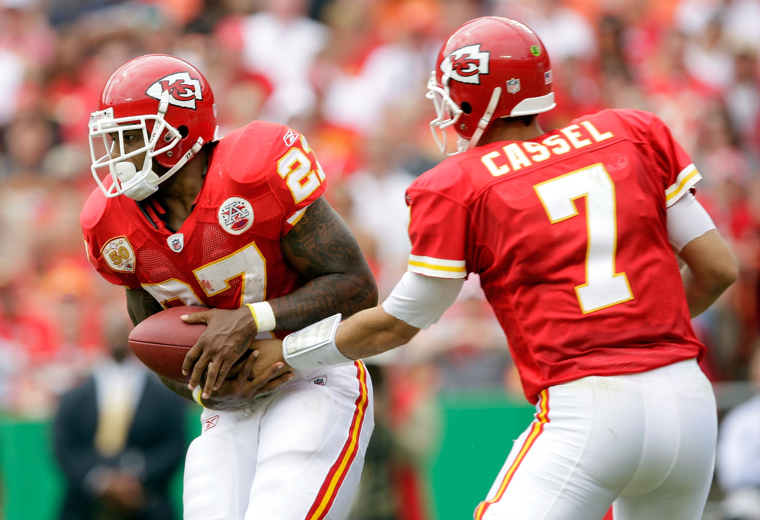 KANSAS CITY, MO - SEPTEMBER 20: Quarterback Matt Cassell #7 of the Kansas City Chiefs hands off to running back Larry Johnson #27 during the game against the Oakland Raiders at Arrowhead Stadium on September 20, 2009 in Kansas City, Missouri. (Photo by KANSAS CITY, MO - SEPTEMBER 20: Quarterback Matt Cassell #7 of the Kansas City Chiefs hands off to running back Larry Johnson #27 during the game against the Oakland Raiders at Arrowhead Stadium on September 20, 2009 in Kansas City, Missouri. (Photo by