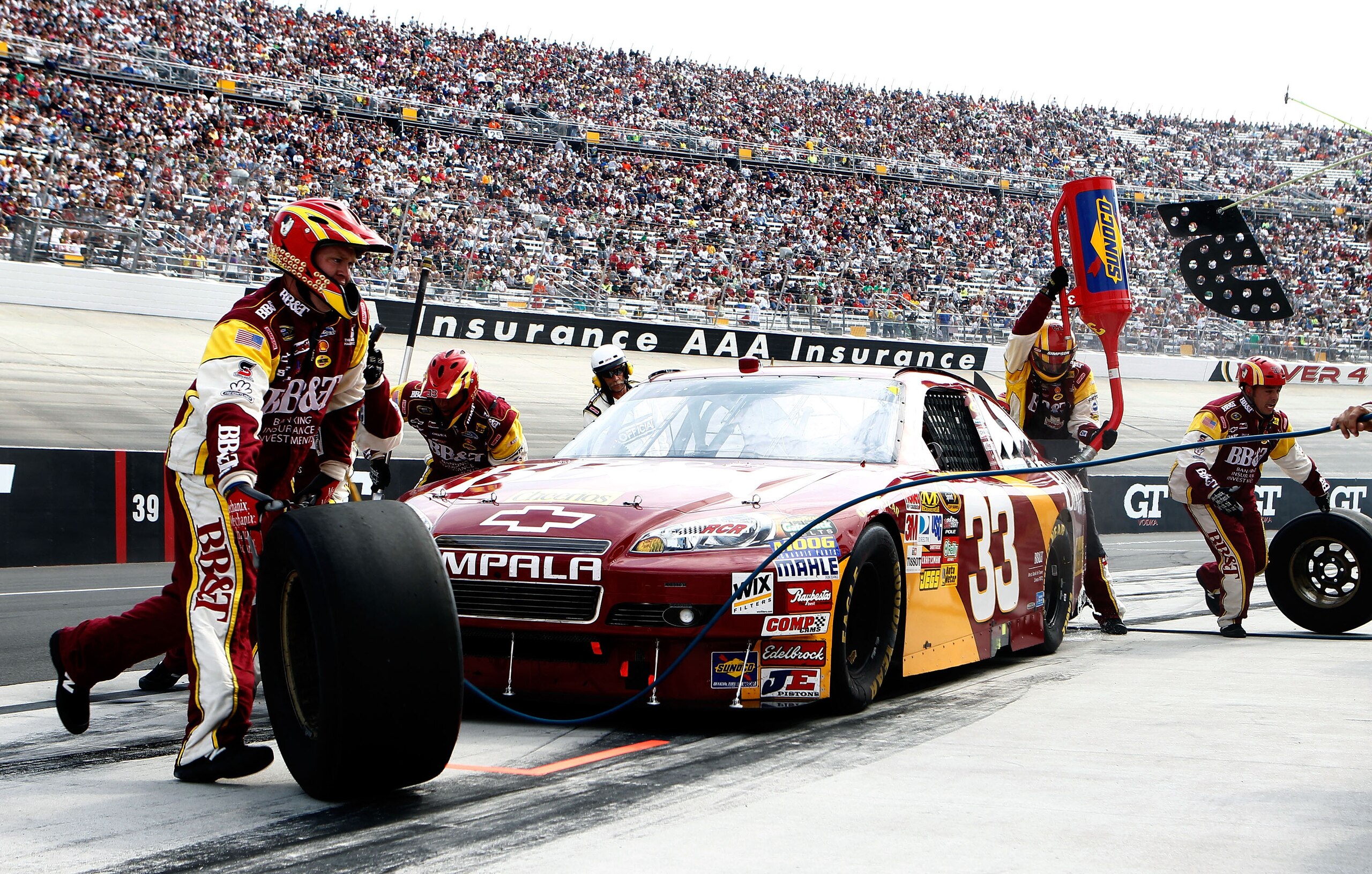 DOVER, DE - SEPTEMBER 26:  Clint Bowyer, driver of the #33 BB&T Chevrolet, pits during the NASCAR Sprint Cup Series AAA 400 at Dover International Speedway on September 26, 2010 in Dover, Delaware.  (Photo by Jeff Zelevansky/Getty Images for NASCAR)