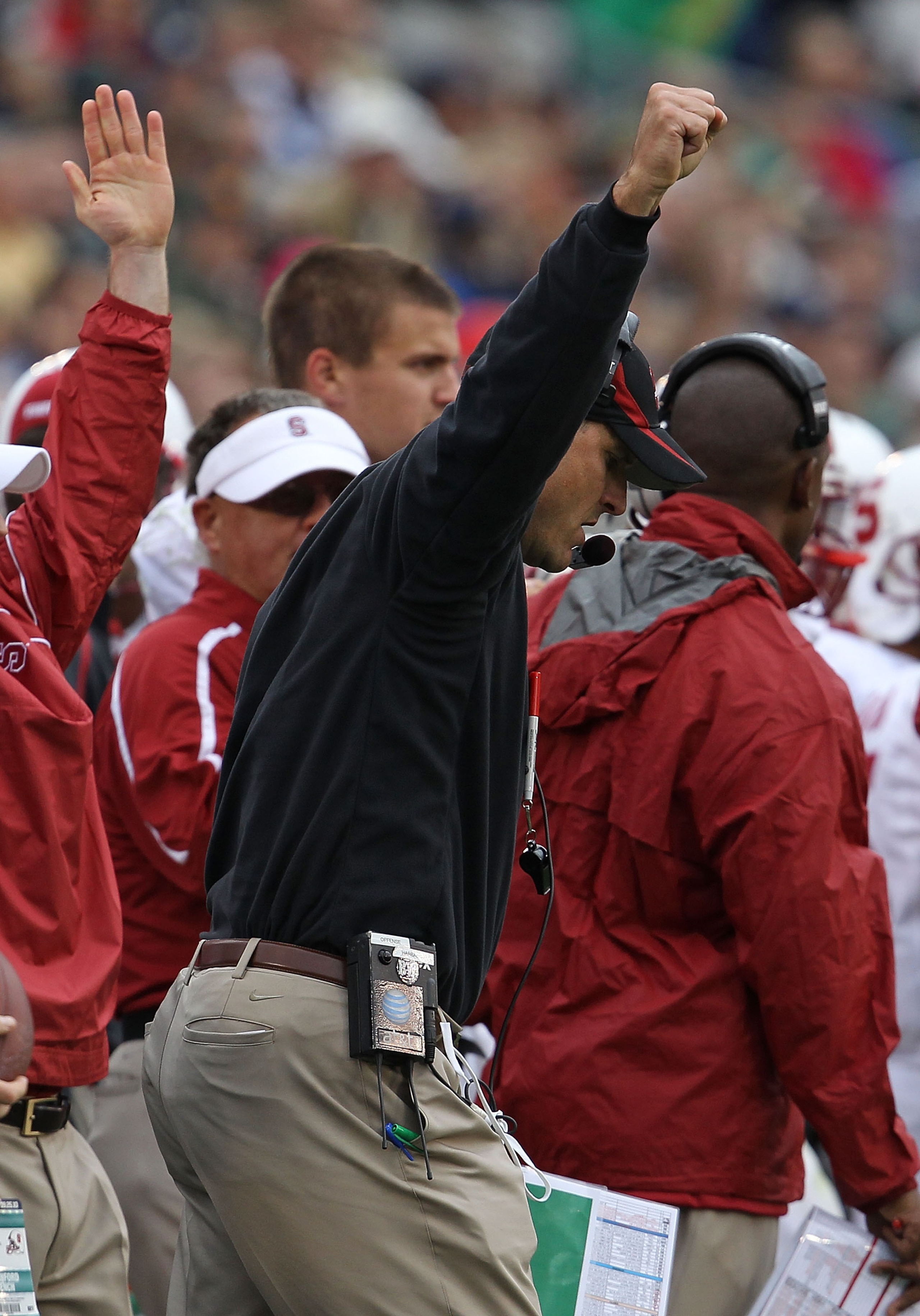 SOUTH BEND, IN - SEPTEMBER 25: Head coach Jim Harbaugh of the Stanford Cardinal celebrates a score against the Notre Dame Fighting Irish at Notre Dame Stadium on September 25, 2010 in South Bend, Indiana. Stanford defeated Notre Dame 37-14.  (Photo by Jon