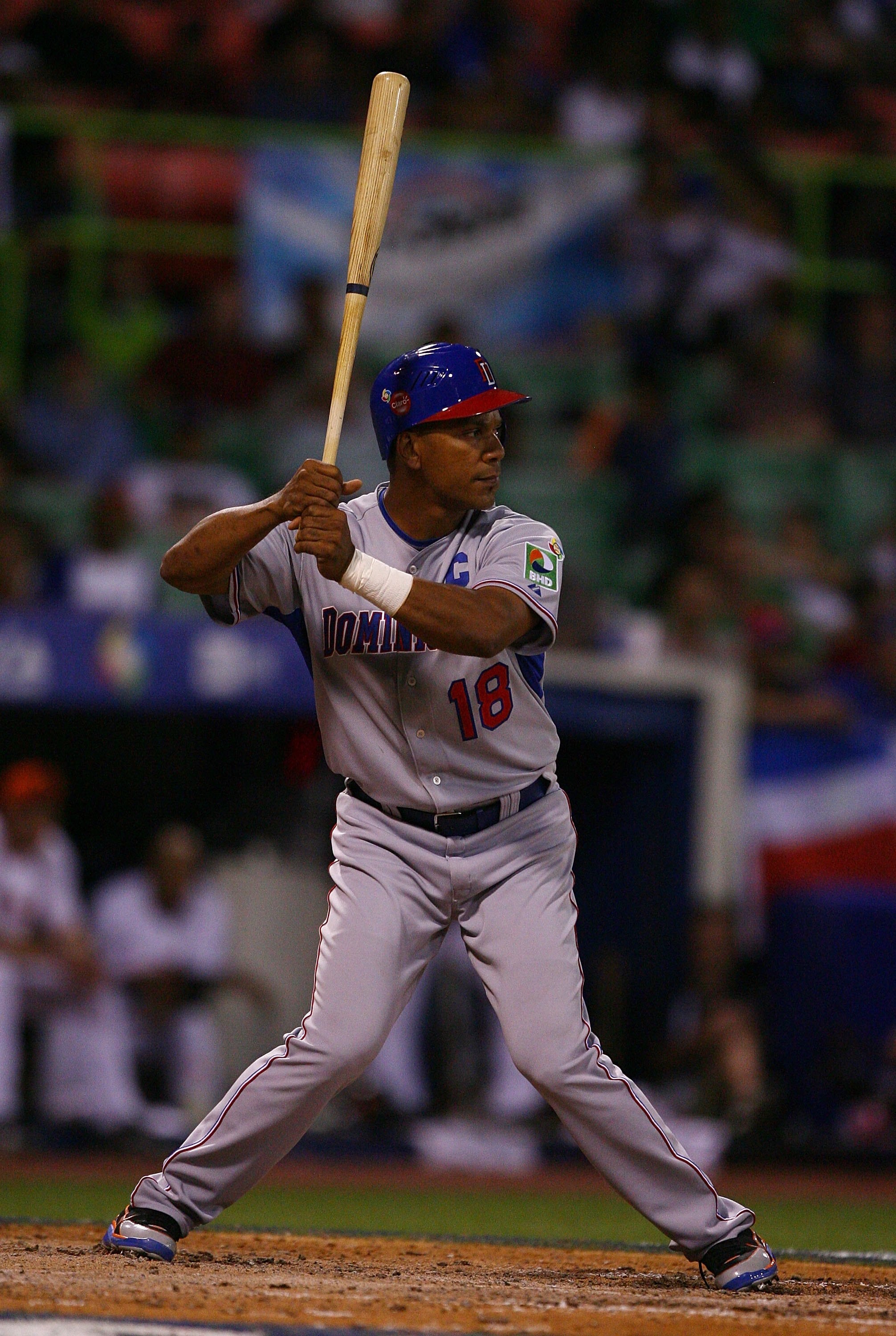 SAN JUAN, PUERTO RICO - MARCH 10:  Moises Alou #18  of The Dominican Republic bats against The Netherlands during the 2009 World Baseball Classic Pool D match on March 10, 2009 at Hiram Bithorn Stadium in San Juan, Puerto Rico.  (Photo by Al Bello/Getty I