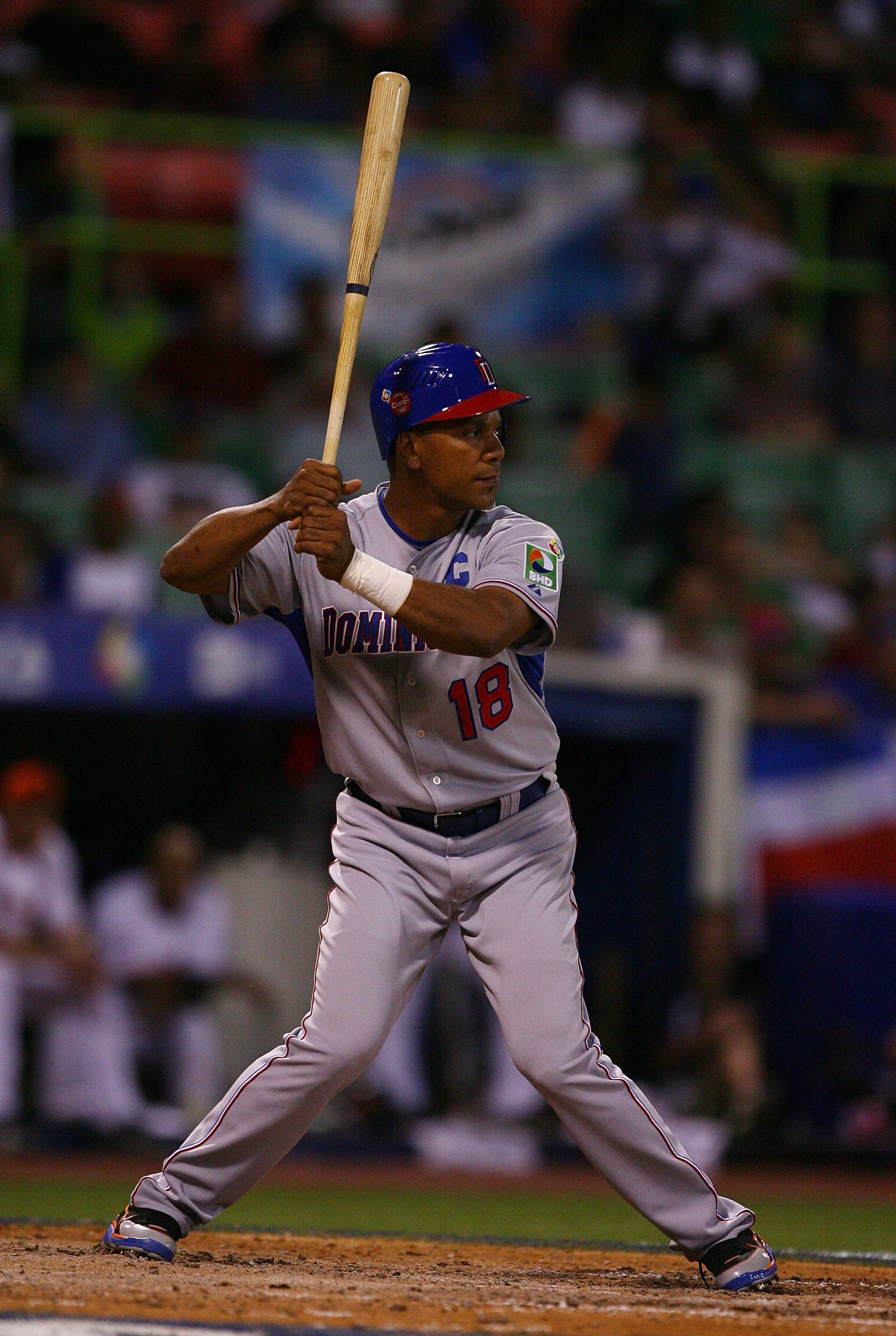 SAN JUAN, PUERTO RICO - MARCH 10:  Moises Alou #18  of The Dominican Republic bats against The Netherlands during the 2009 World Baseball Classic Pool D match on March 10, 2009 at Hiram Bithorn Stadium in San Juan, Puerto Rico.  (Photo by Al Bello/Getty I