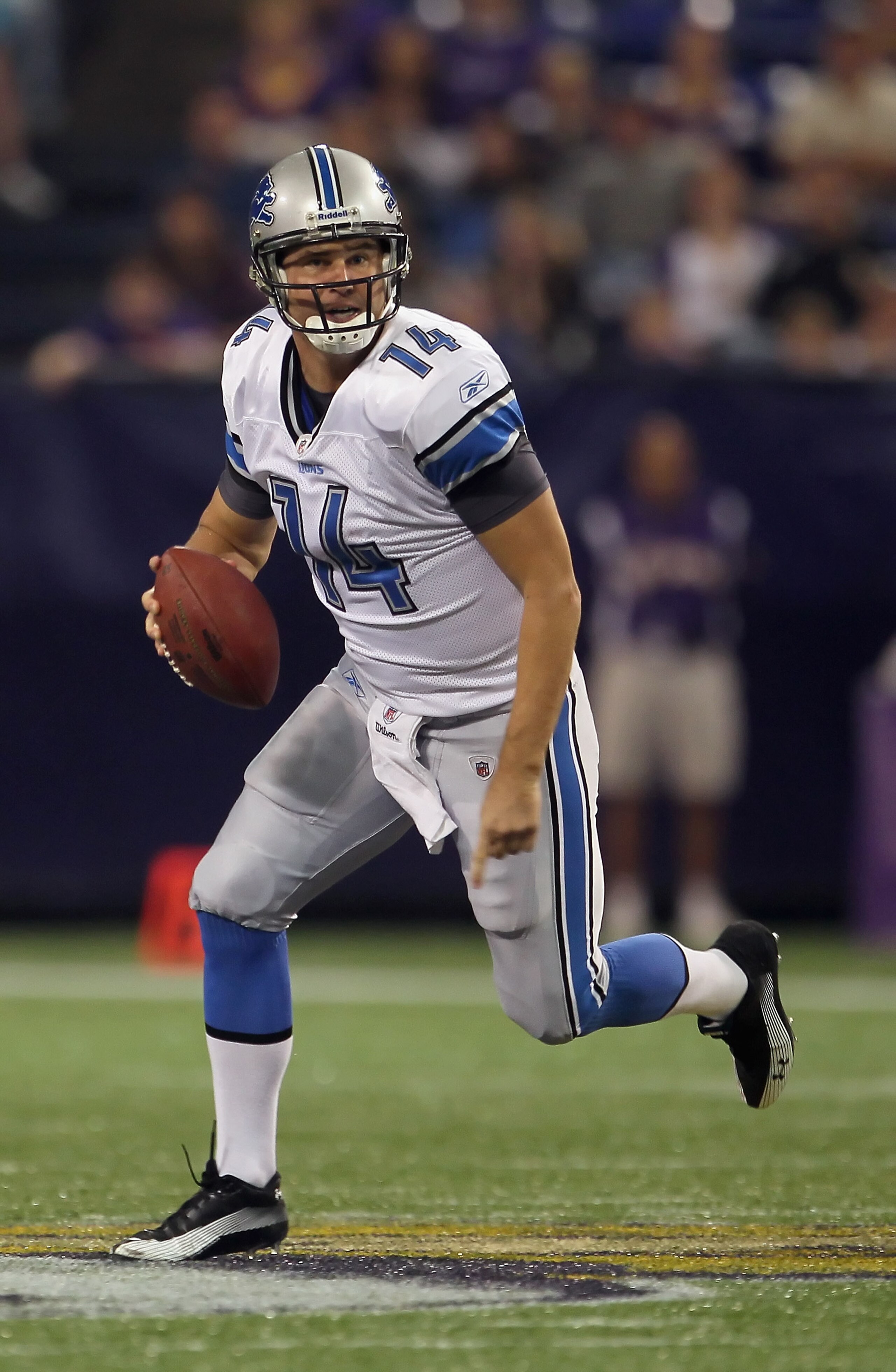 MINNEAPOLIS - SEPTEMBER 26:  Quarterback Shaun Hill #14 of the Detroit Lions scrambles out of the pocket against the Minnesota Vikings during the first half at Hubert H. Humphrey Metrodome on September 26, 2010 in Minneapolis, Minnesota.  (Photo by Jeff G