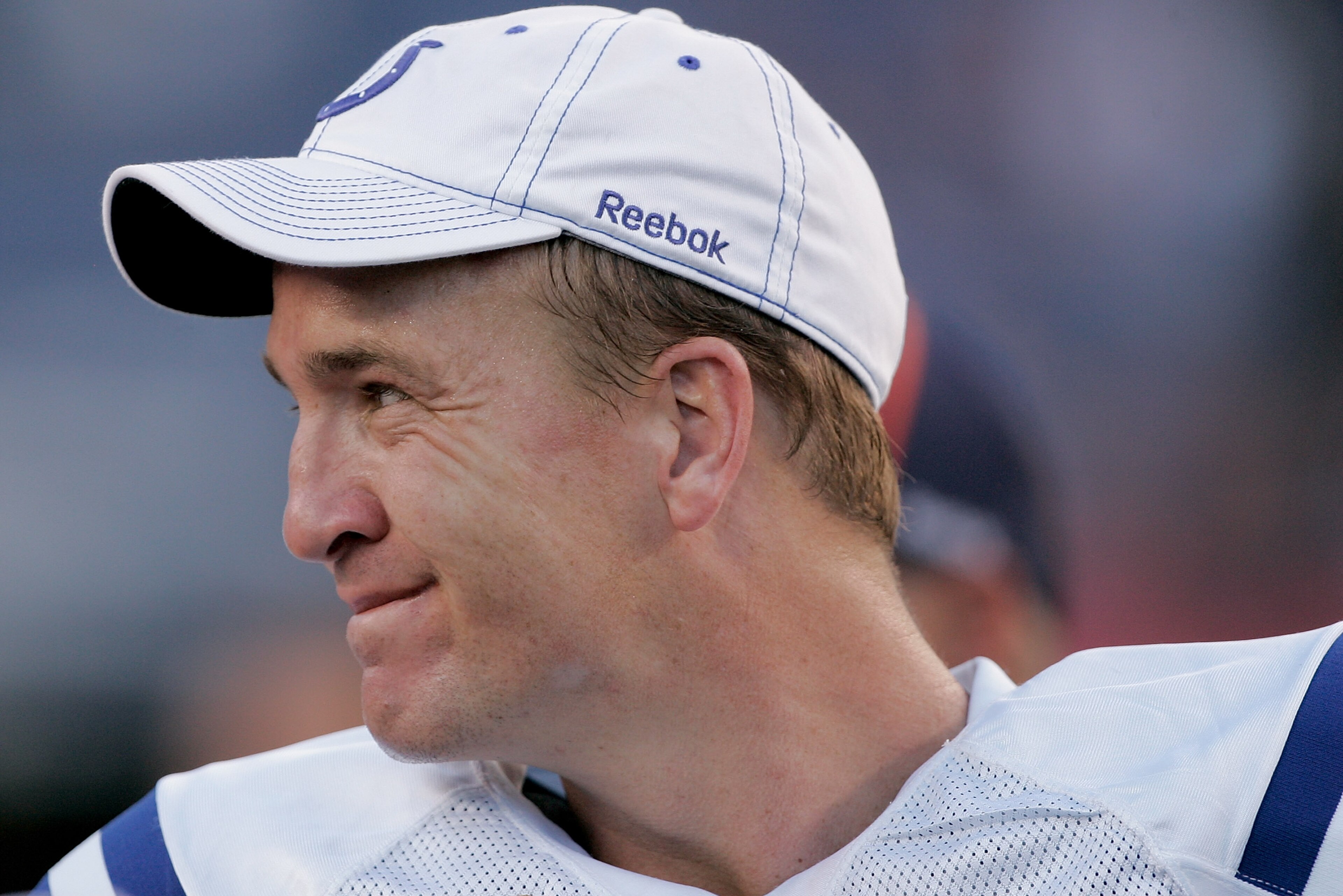 DENVER - SEPTEMBER 26:  Quarterback Peyton Manning #18 of the Indianapolis Colts smiles after defeating the Denver Broncos 27-13 at INVESCO Field at Mile High on September 26, 2010 in Denver, Colorado.  (Photo by Justin Edmonds/Getty Images)