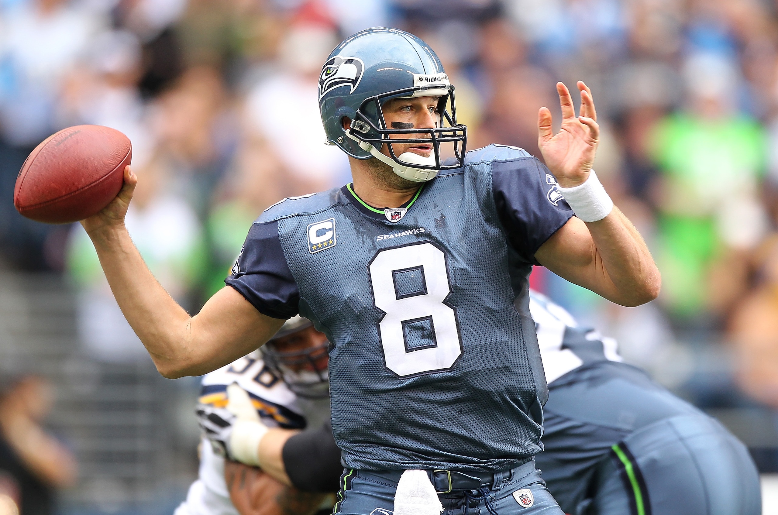 SEATTLE - SEPTEMBER 26:  Quarterback Matt Hasselbeck #8 of the Seattle Seahawks passes against the San Diego Chargers at Qwest Field on September 26, 2010 in Seattle, Washington. The Seahawks defeated the Chargers 27-20. (Photo by Otto Greule Jr/Getty Ima