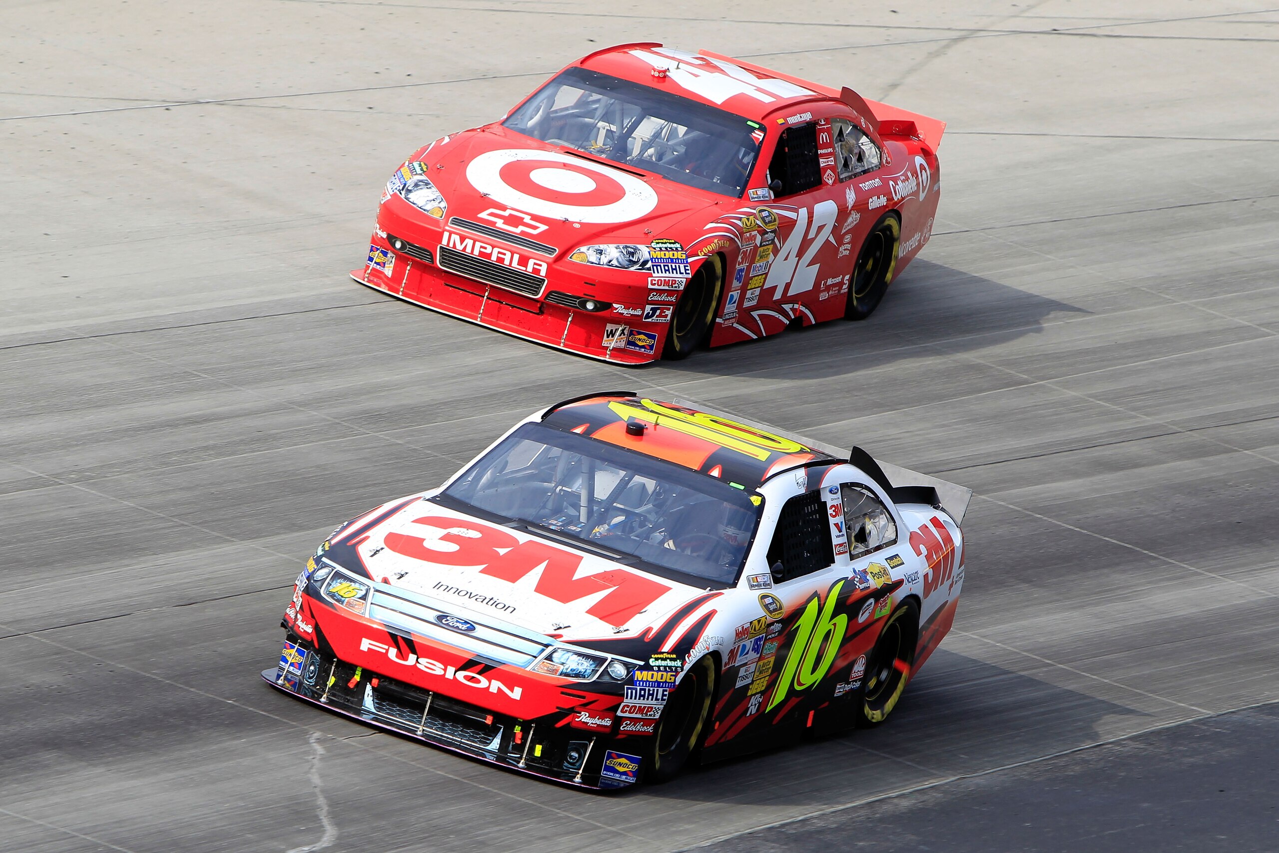 DOVER, DE - SEPTEMBER 26:  Greg Biffle, driver of the #16 3M Ford, races Juan Pablo Montoya, driver of the #42 Target Chevrolet, during the NASCAR Sprint Cup Series AAA 400 at Dover International Speedway on September 26, 2010 in Dover, Delaware.  (Photo 