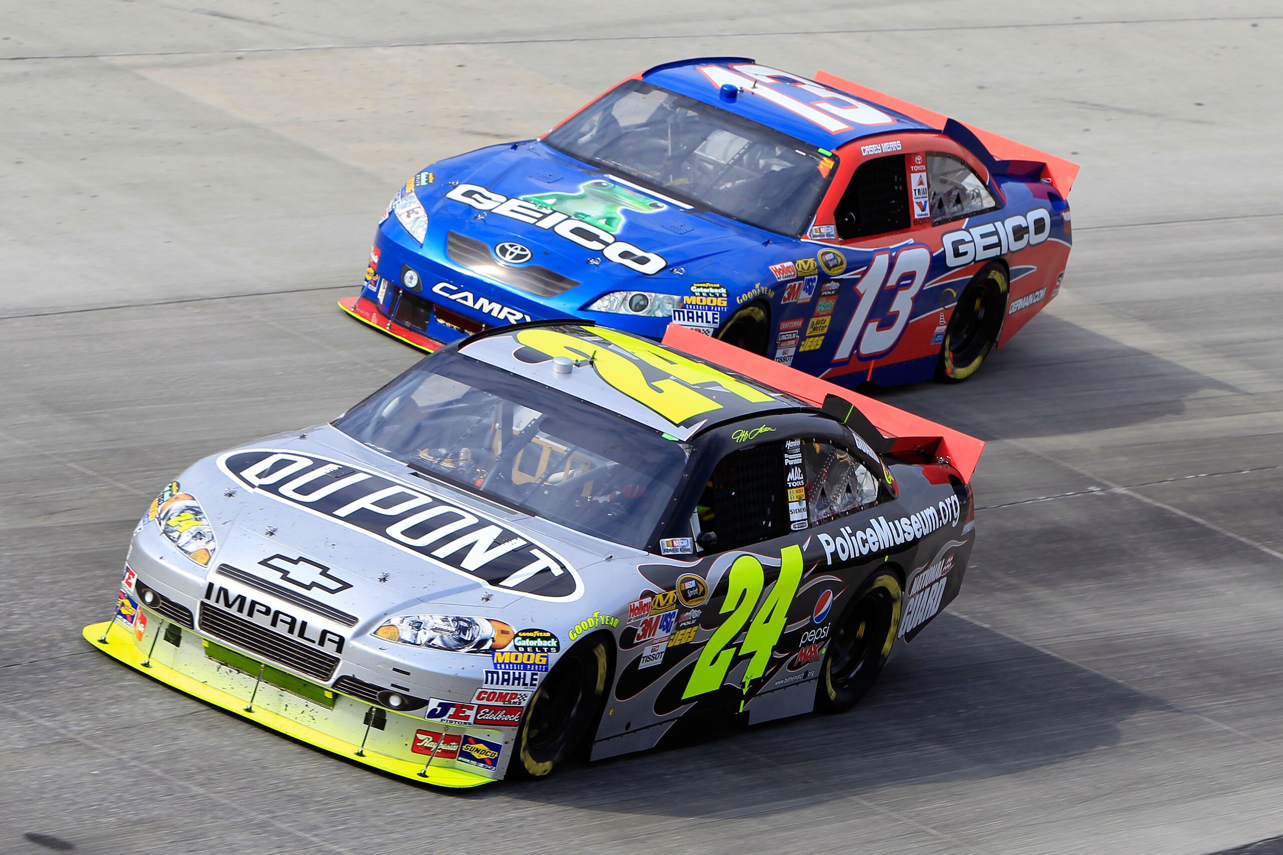 DOVER, DE - SEPTEMBER 26:  Jeff Gordon, driver of the #24 DuPont Chevrolet, races Casey Mears, driver of the #13 GEICO Toyota, during the NASCAR Sprint Cup Series AAA 400 at Dover International Speedway on September 26, 2010 in Dover, Delaware.  (Photo by