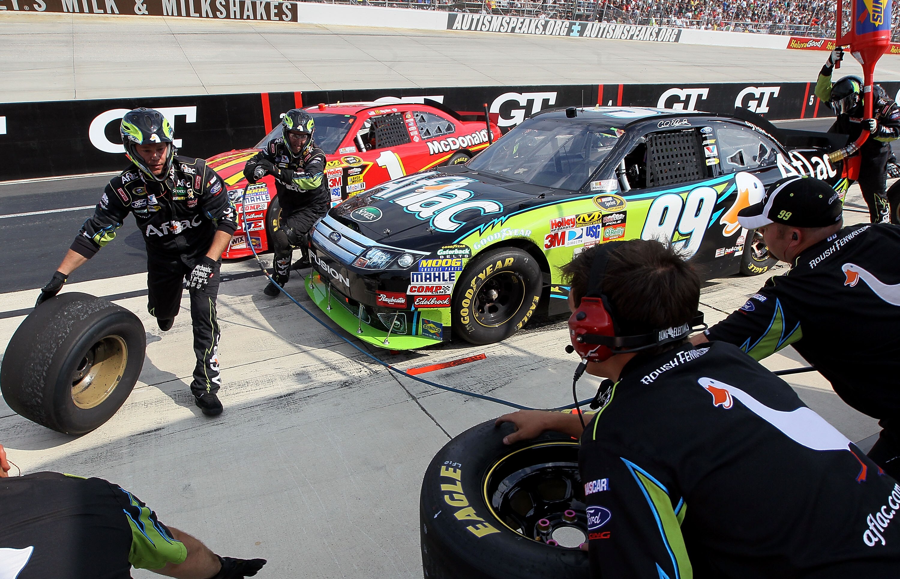 DOVER, DE - SEPTEMBER 26:  Carl Edwards, driver of the #99 Aflac Ford, pits during the NASCAR Sprint Cup Series AAA 400 at Dover International Speedway on September 26, 2010 in Dover, Delaware.  (Photo by Jim McIsaac/Getty Images for NASCAR)