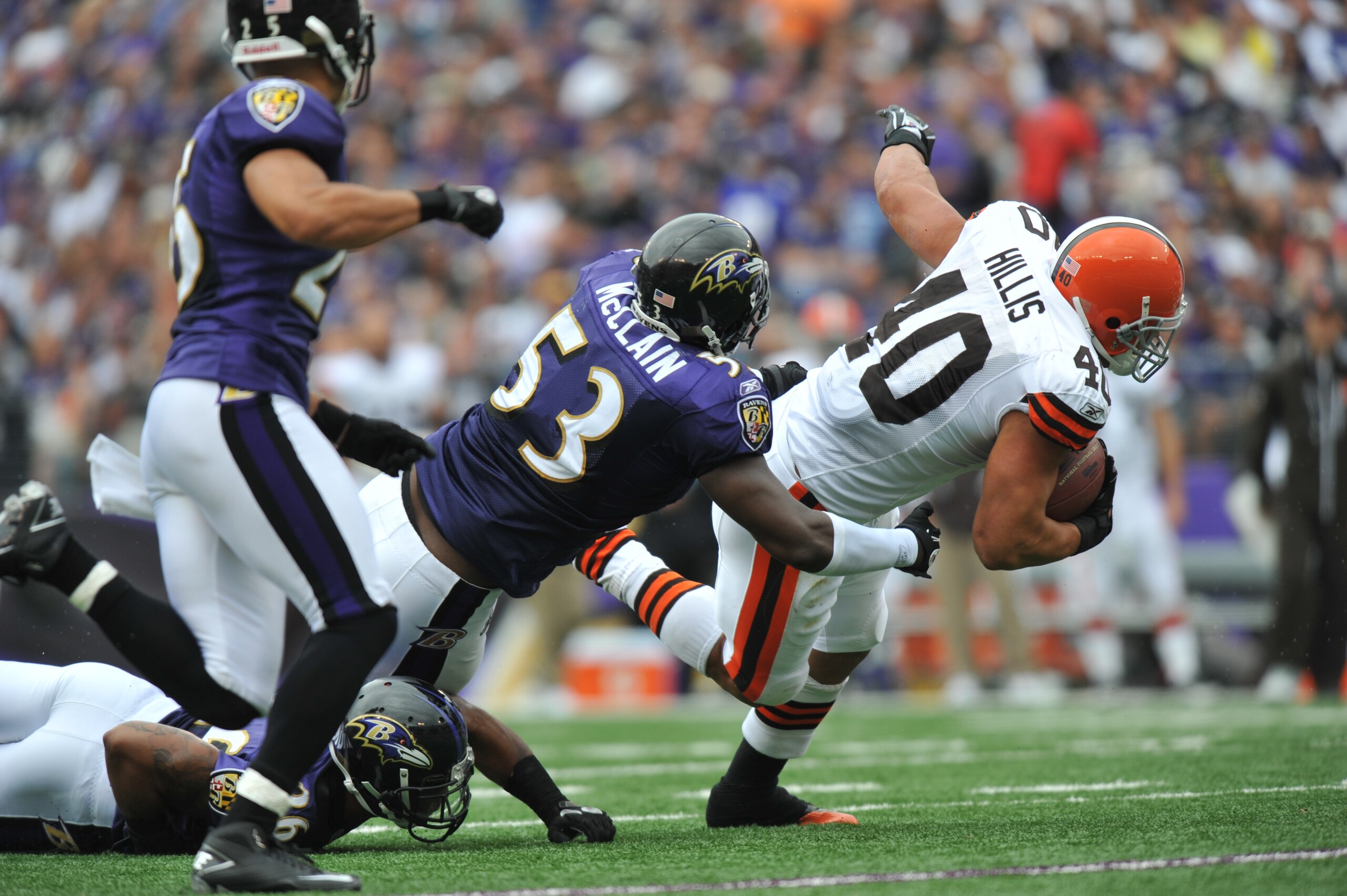 BALTIMORE - SEPTEMBER 26:  Peyton Hills #40 of the Cleveland Browns is stopped by Jameel McClain #53 of the Baltimore Ravens at M&T Bank Stadium on September 26, 2010 in Baltimore, Maryland. The Ravens defeated the Browns 24-17. (Photo by Larry French/Get
