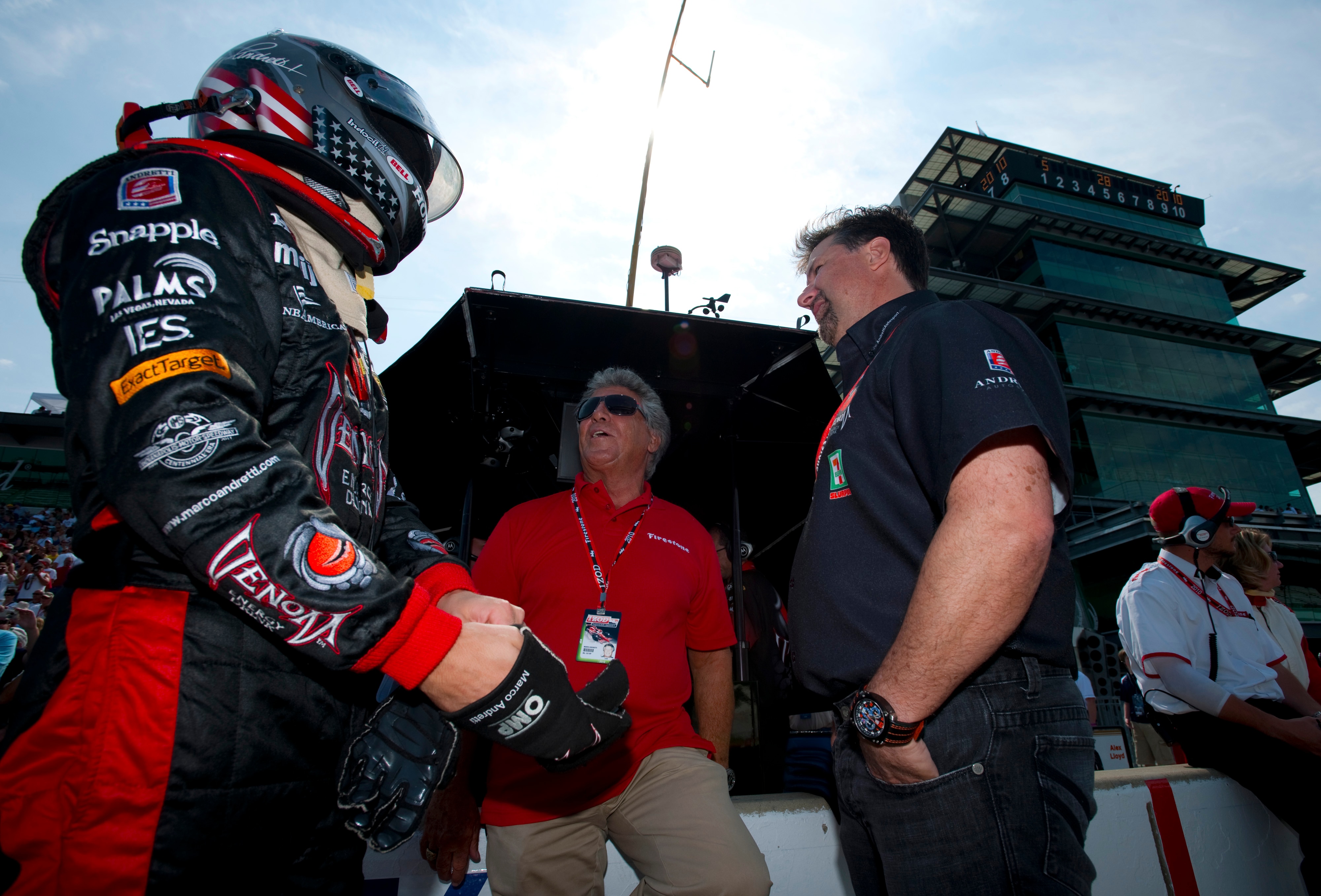 INDIANAPOLIS - MAY 28:  Marco Andretti (L) driver of the #26 Andretti Autosports Dallara Honda with his grandfather Mario Andretti and his father Michael Andretti during final practice for the IZOD IndyCar Series 94th running of the Indianapolis 500 at th