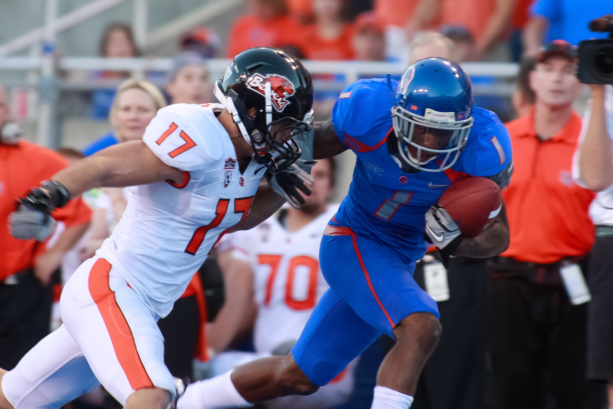 BOISE, ID - SEPTEMBER 25: Wide receiver Titus Young #1 of the Boise State Broncos runs the ball against cornerback Brandon Hardin #17 of the Oregon State Beavers at Bronco Stadium on September 25, 2010 in Boise, Idaho. (Photo by Otto Kitsinger III/Getty BOISE, ID - SEPTEMBER 25: Wide receiver Titus Young #1 of the Boise State Broncos runs the ball against cornerback Brandon Hardin #17 of the Oregon State Beavers at Bronco Stadium on September 25, 2010 in Boise, Idaho. (Photo by Otto Kitsinger III/Getty