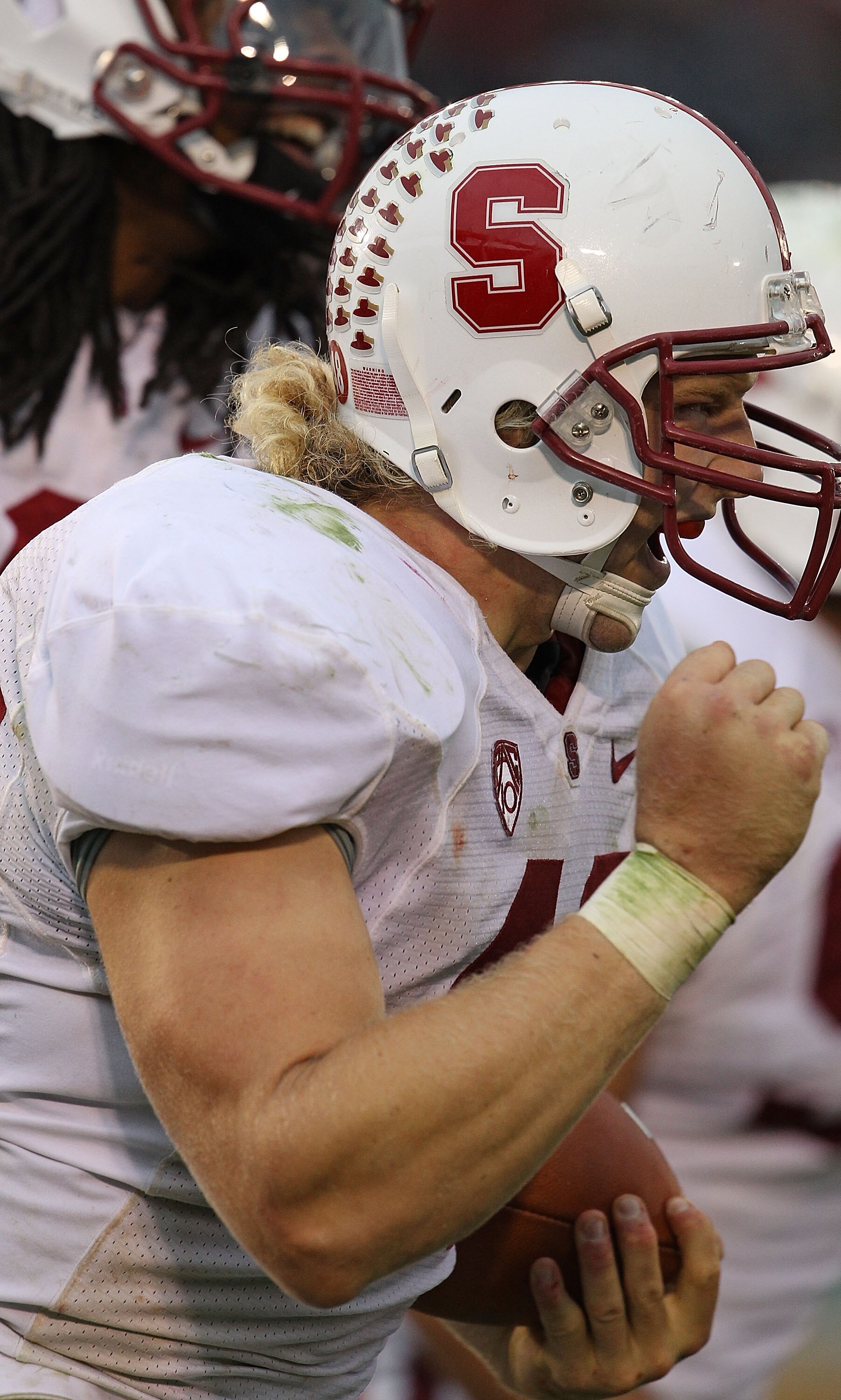 SOUTH BEND, IN - SEPTEMBER 25: Owen Marecic #48 of the Stanford Cardinal celebrates after scoring a defensive touchdown with a pass interception against the Notre Dame Fighting Irish at Notre Dame Stadium on September 25, 2010 in South Bend, Indiana. Stan