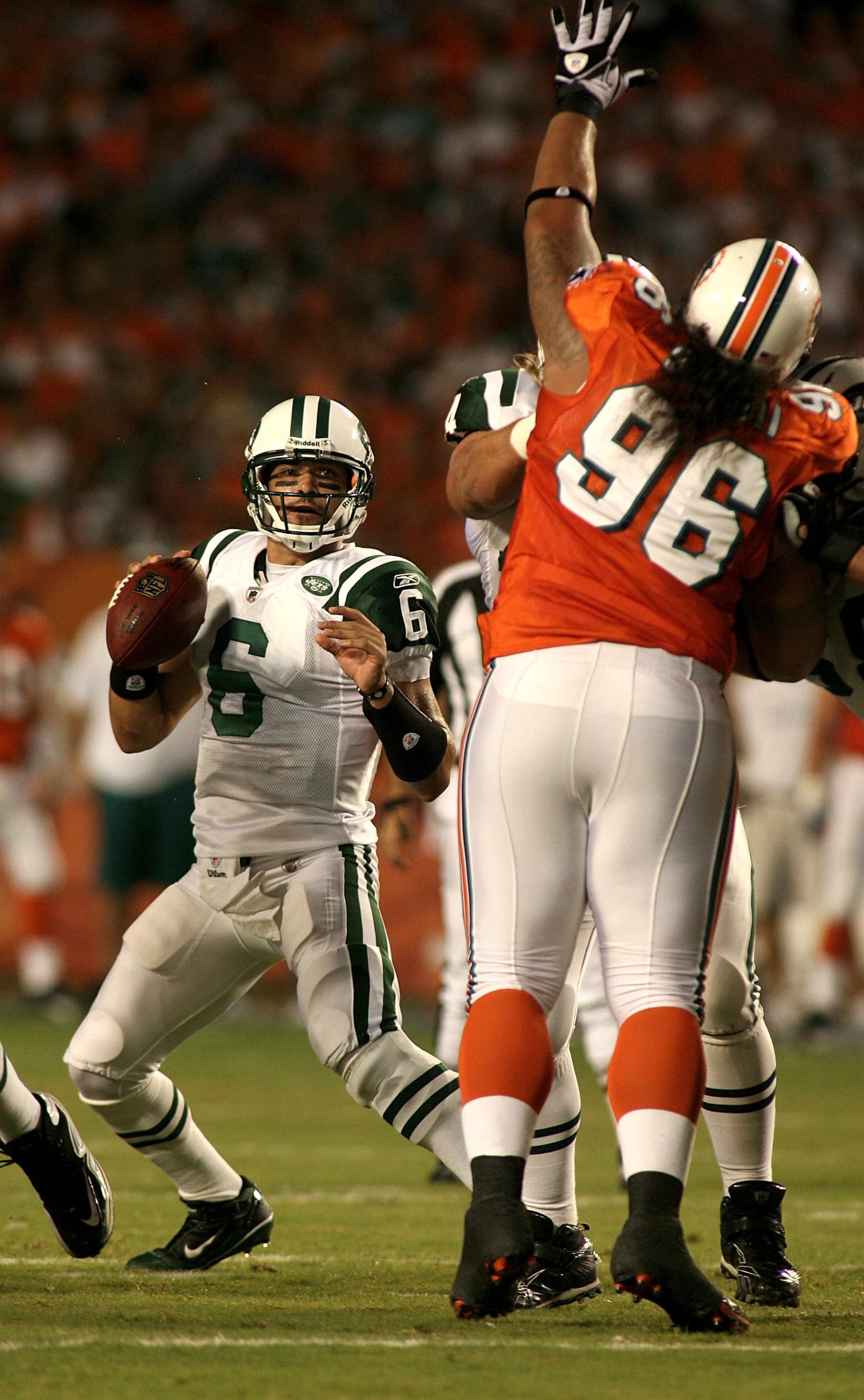 MIAMI - SEPTEMBER 26: Quarterback Mark Sanchez #6 of the New York Jets throws against the Miami Dolphins at Sun Life Stadium on September 26, 2010 in Miami, Florida. (Photo by Marc Serota/Getty Images) MIAMI - SEPTEMBER 26: Quarterback Mark Sanchez #6 of the New York Jets throws against the Miami Dolphins at Sun Life Stadium on September 26, 2010 in Miami, Florida. (Photo by Marc Serota/Getty Images)