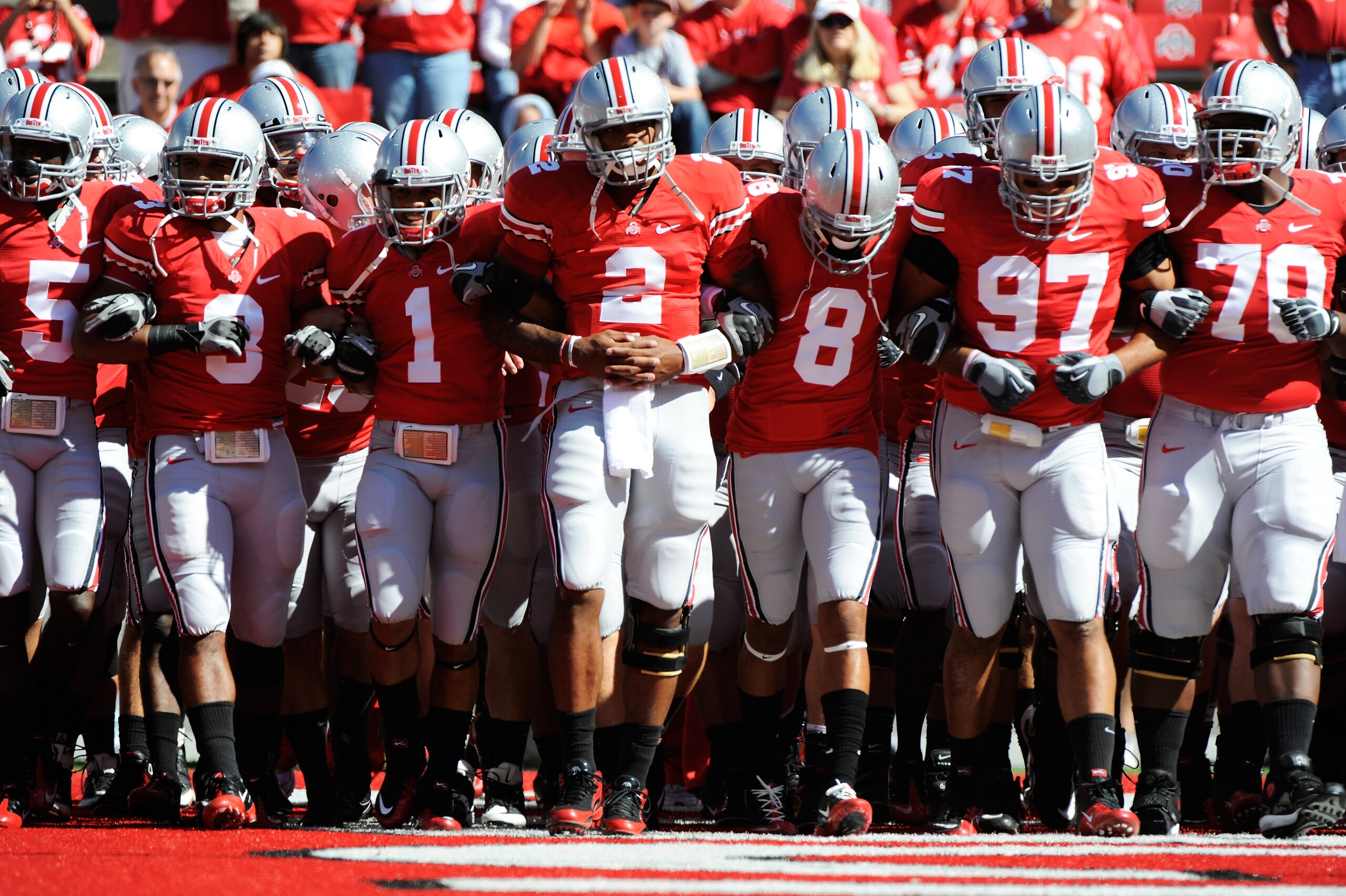 COLUMBUS, OH - SEPTEMBER 25:  Led by quarterback Terrelle Pryor #2, the Ohio State Buckeyes take the field for pregame warm ups before playing the Eastern Michigan Eagles at Ohio Stadium on September 25, 2010 in Columbus, Ohio.  (Photo by Jamie Sabau/Gett