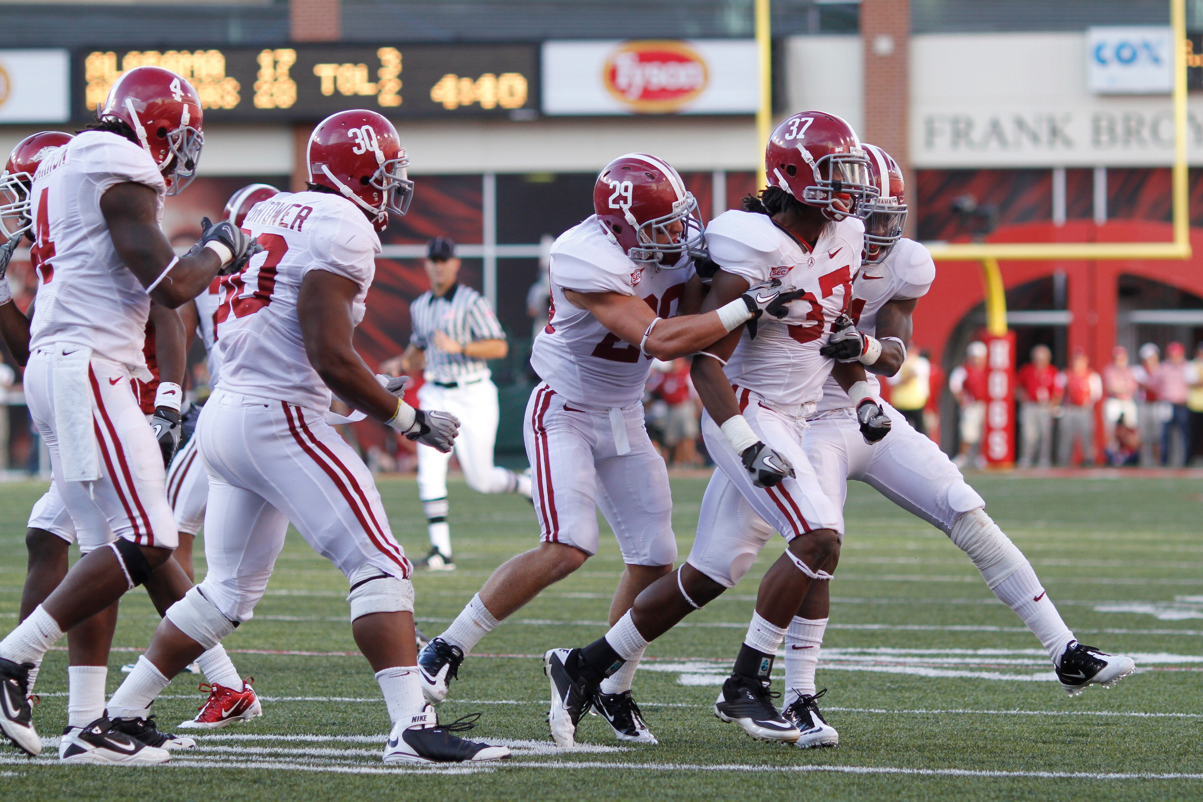 FAYETTEVILLE - SEPTEMBER 25: Robert Lester #37 of the Alabama Crimson Tide celebrates with teammates after his interception which set up the game winning score against the Arkansas Razorbacks at Donald W. Reynolds Razorback Stadium on September 25, 2010 i FAYETTEVILLE - SEPTEMBER 25: Robert Lester #37 of the Alabama Crimson Tide celebrates with teammates after his interception which set up the game winning score against the Arkansas Razorbacks at Donald W. Reynolds Razorback Stadium on September 25, 2010 i