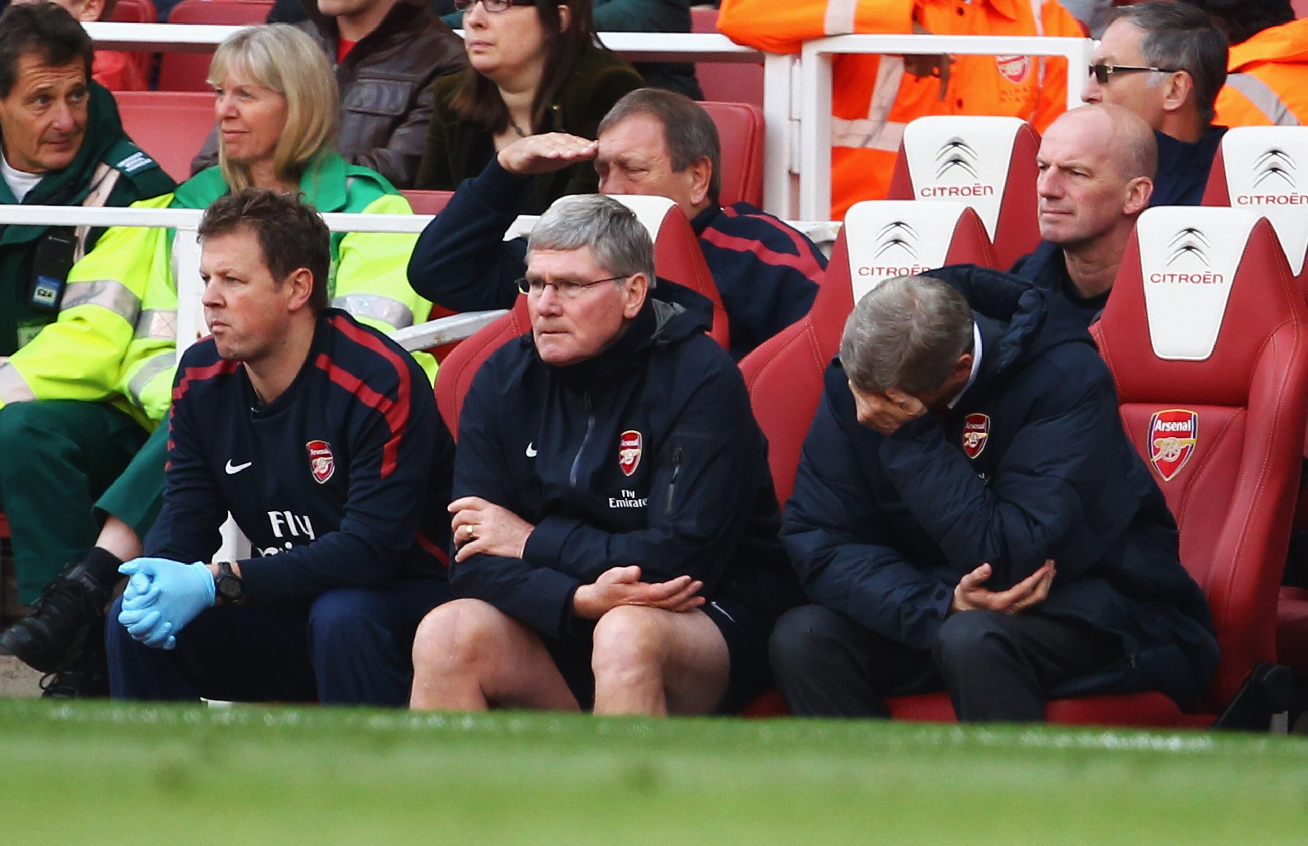LONDON, ENGLAND - SEPTEMBER 25:  Arsene Wenger manager of Arsenal (R) reacts as he sits on the bench during the Barclays Premier League match between Arsenal and West Bromwich Albion at the Emirates Stadium on September 25, 2010 in London, England.  (Phot