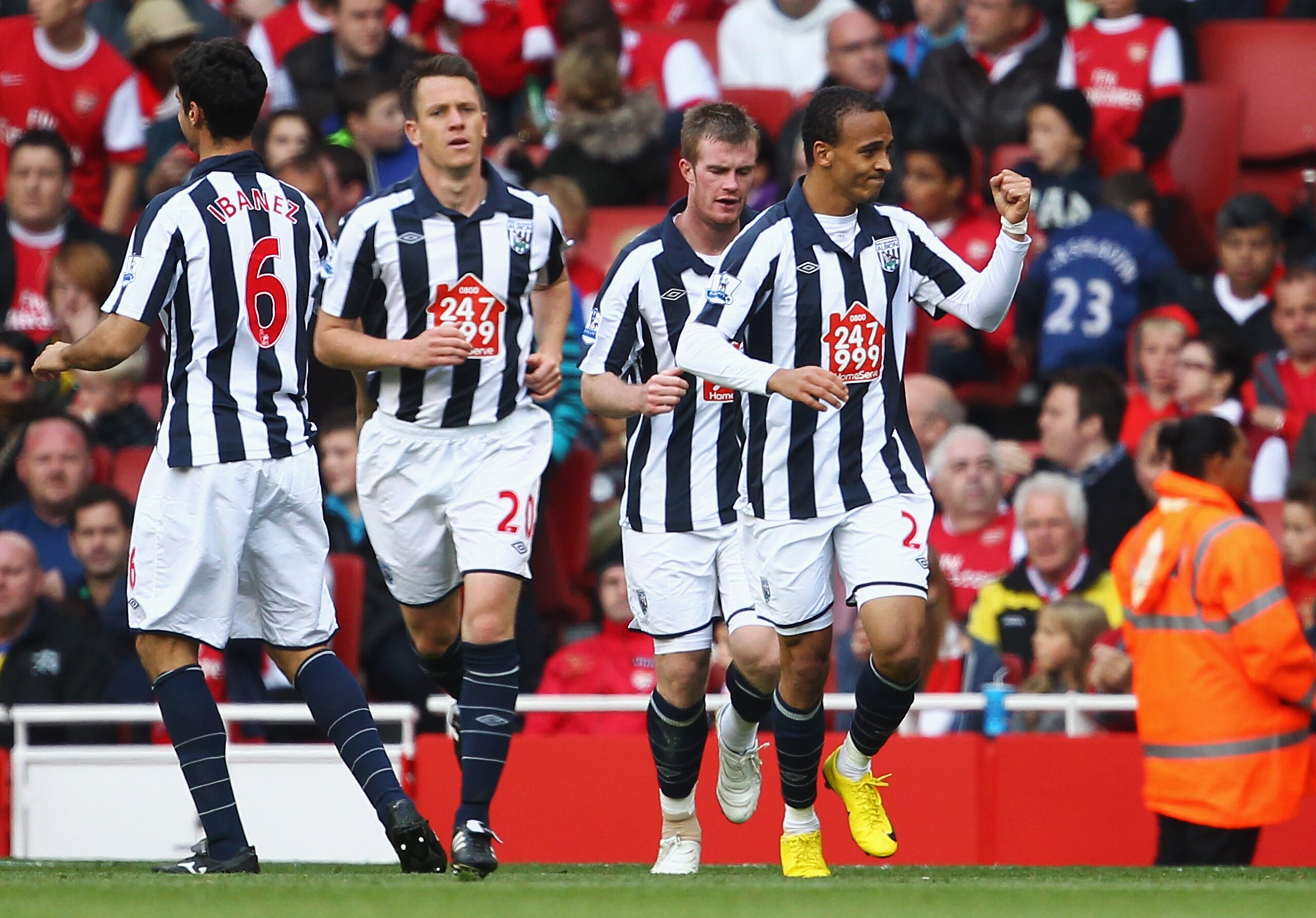 LONDON, ENGLAND - SEPTEMBER 25:  Peter Odemwingie of West Bromwich Albion (R) celebrates as he scores their first goal during the Barclays Premier League match between Arsenal and West Bromwich Albion at the Emirates Stadium on September 25, 2010 in Londo