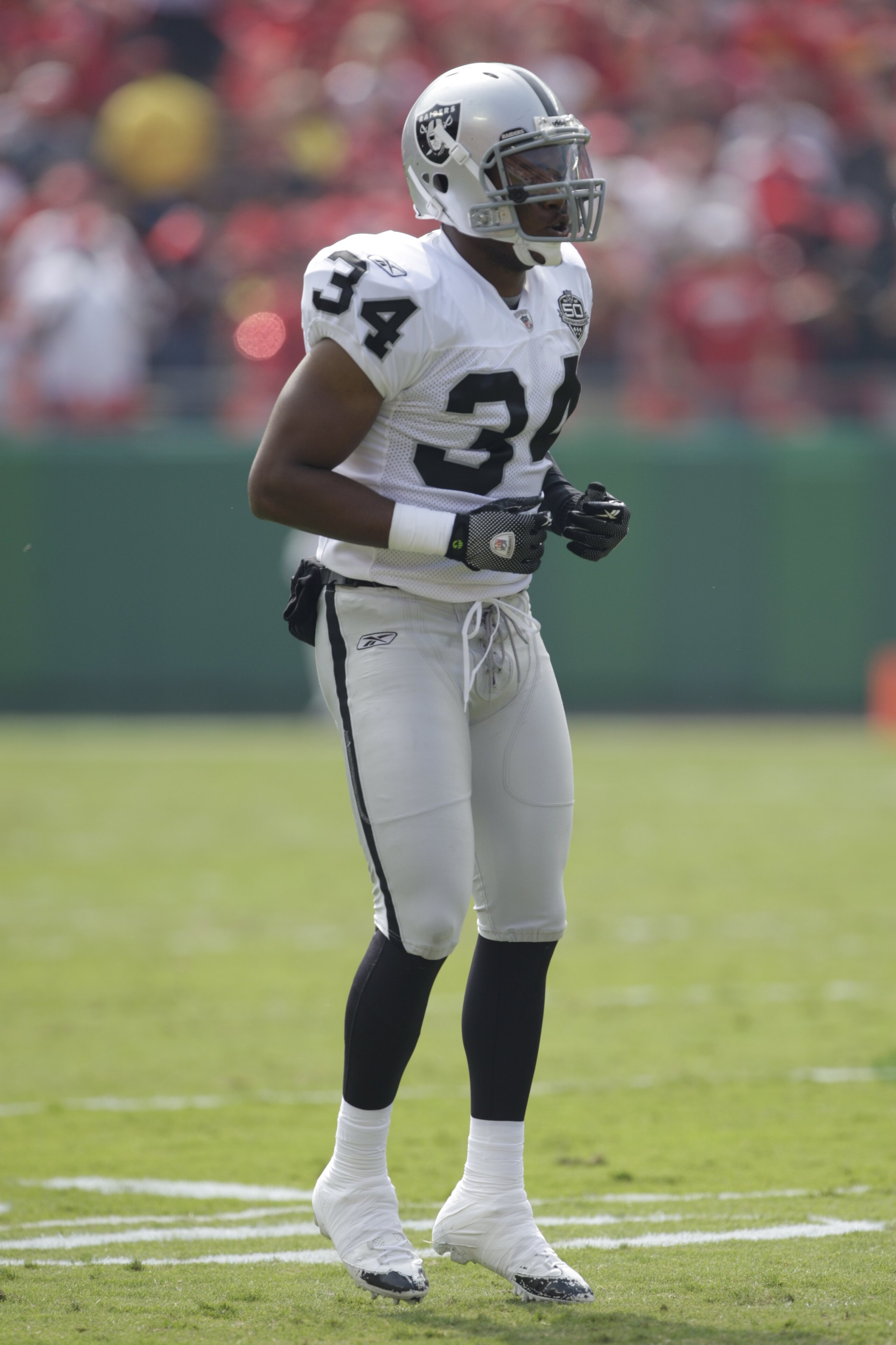 KANSAS CITY, MO - SEPTEMBER 20:  Mike Mitchell #34 of the Oakland Raiders stands on the field during the game against the Kansas City Chiefs at Arrowhead Stadium on September 20, 2009 in Kansas City, Missouri. (Photo by Jamie Squire/Getty Images)