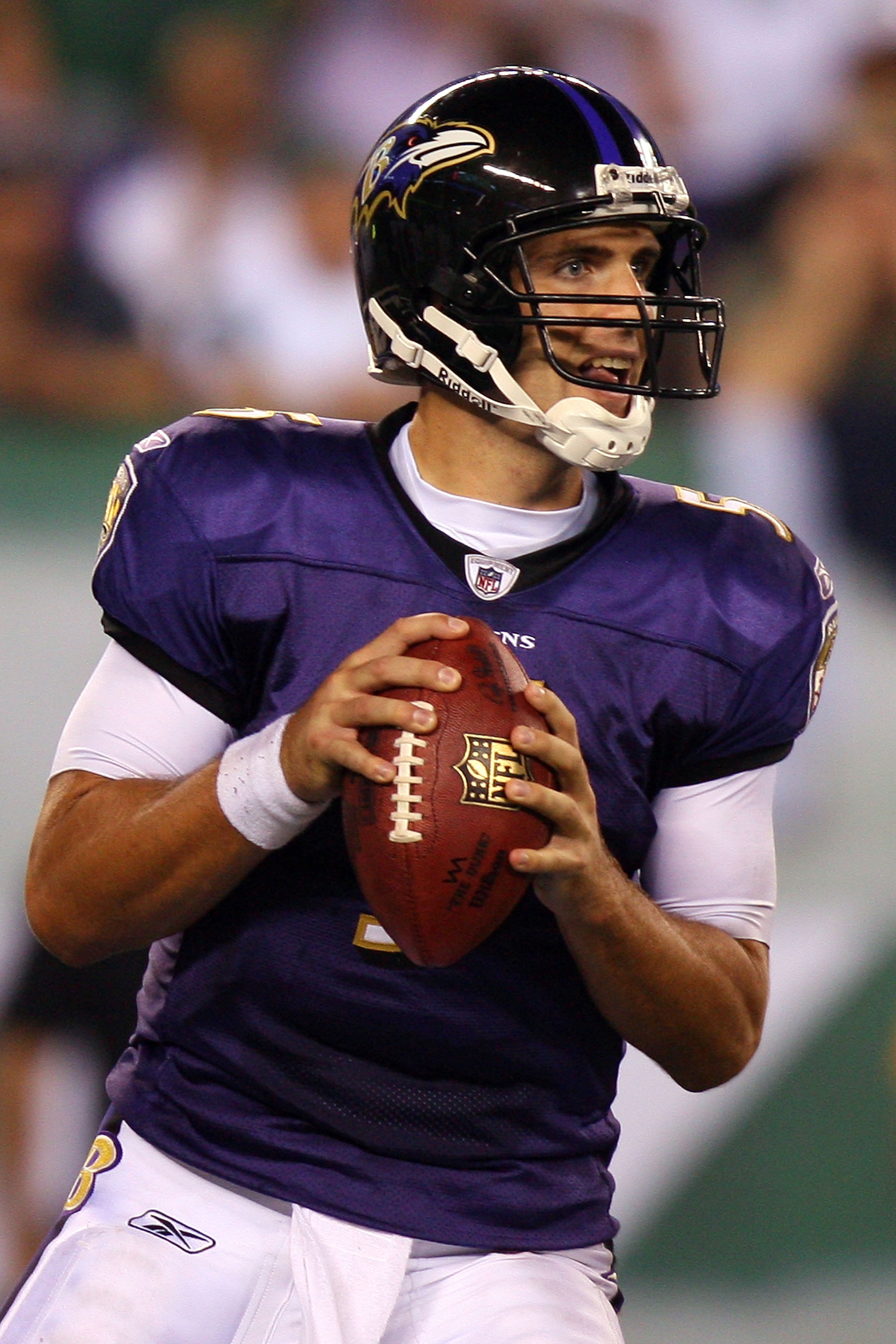 EAST RUTHERFORD, NJ - SEPTEMBER 13:  Joe Flacco #5 of the Baltimore Ravens looks to throws a pass against the New York Jets during the home opener at the New Meadowlands Stadium on September 13, 2010 in East Rutherford, New Jersey.  (Photo by Andrew Burto