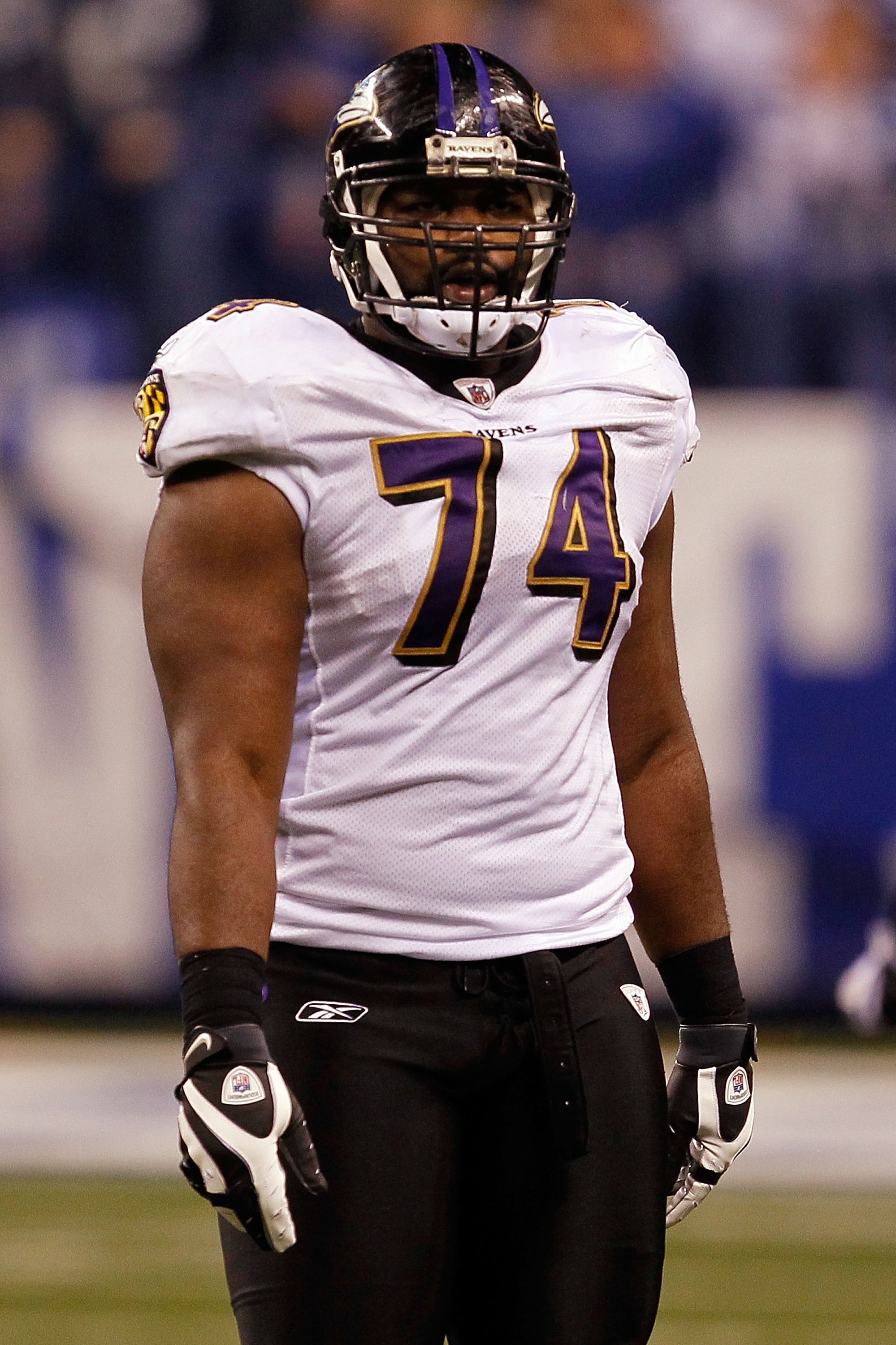 INDIANAPOLIS - JANUARY 16:  Michael Oher #74 of the Baltimore Ravens looks on against the Indianapolis Colts in the AFC Divisional Playoff Game at Lucas Oli Stadium on January 16, 2010 in Indianapolis, Indiana.  The Colts defeated the Ravens 20-3.  (Photo