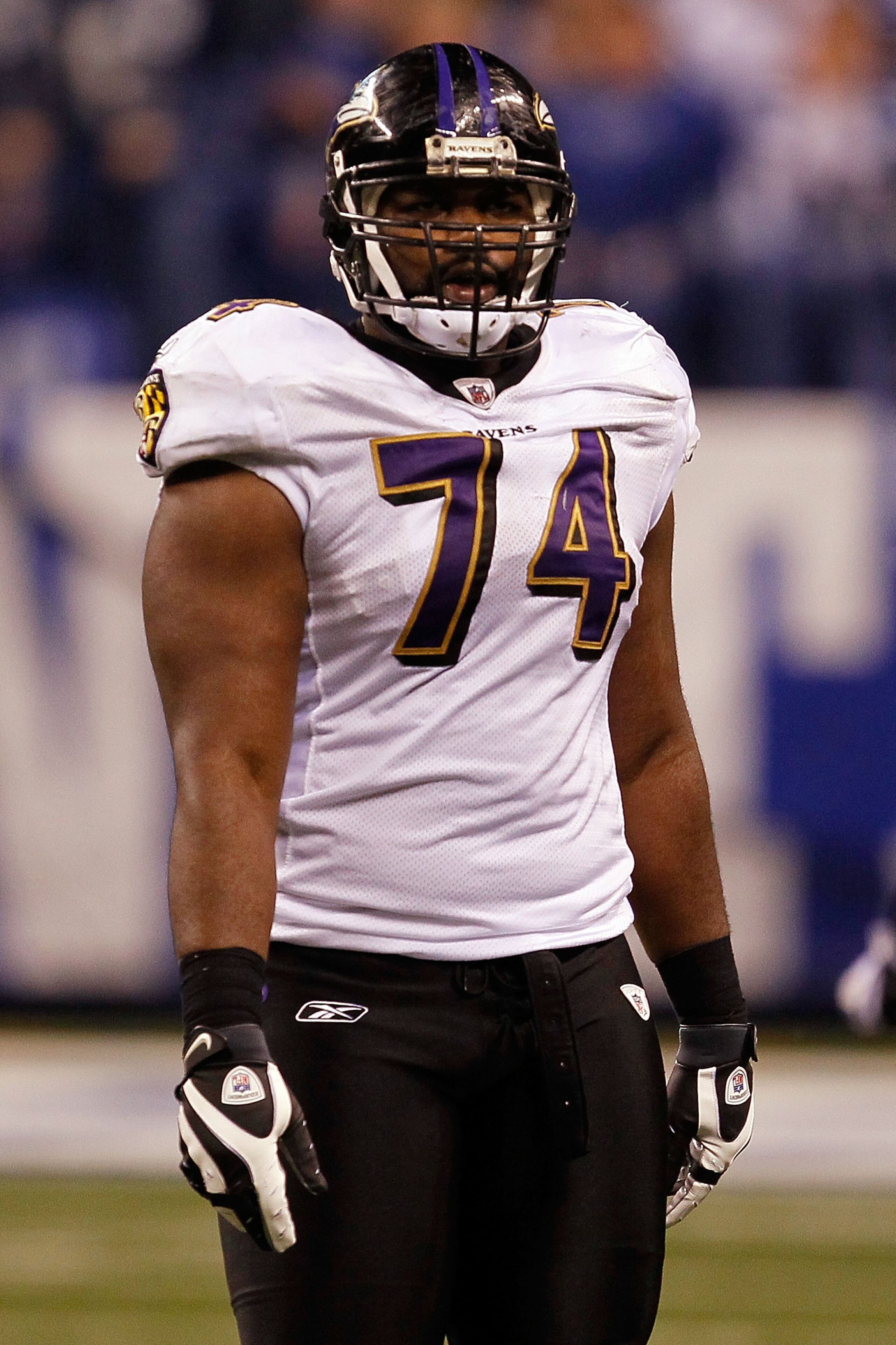 INDIANAPOLIS - JANUARY 16:  Michael Oher #74 of the Baltimore Ravens looks on against the Indianapolis Colts in the AFC Divisional Playoff Game at Lucas Oli Stadium on January 16, 2010 in Indianapolis, Indiana.  The Colts defeated the Ravens 20-3.  (Photo