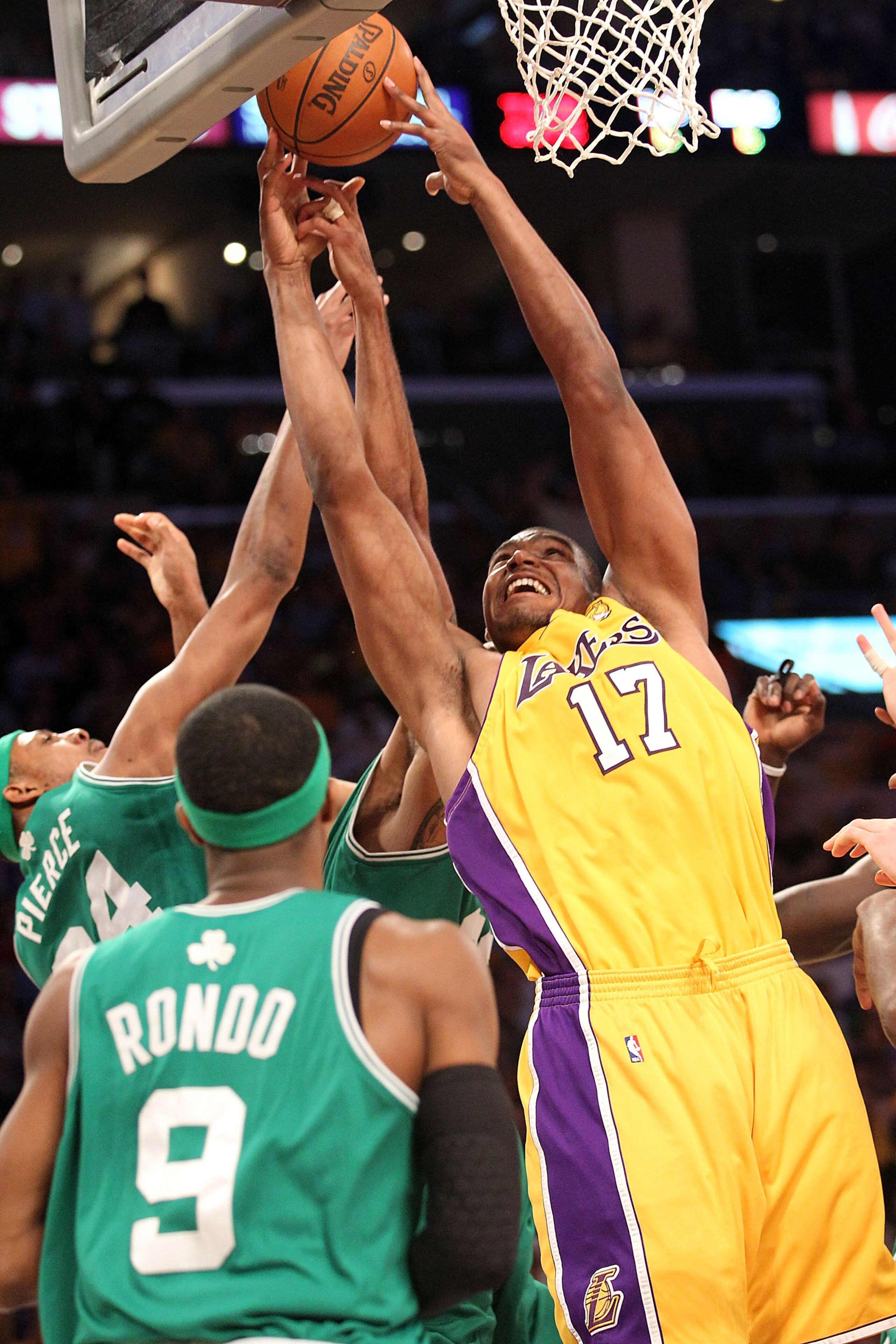 LOS ANGELES, CA - JUNE 17:  Andrew Bynum #17 of the Los Angeles Lakers goes up for a shot over Paul Pierce #34 of the Boston Celtics in the first quarter of Game Seven of the 2010 NBA Finals at Staples Center on June 17, 2010 in Los Angeles, California.  