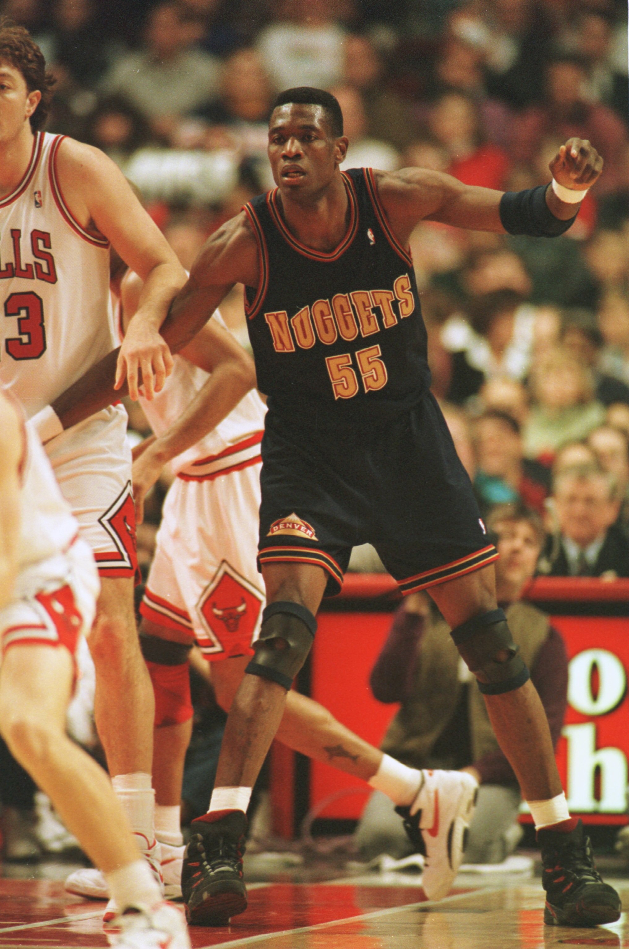 4 Jan 1995: Center Dikembe Mutombo #55 of the Denver Nuggets battles with a defender from the Chicago Bulls for position during the Nuggets 86-80 loss to the Bulls at the United Center in Chicago, Illinois. Mandatory Credit: Jonathan Daniel/ALLSPORT 4 Jan 1995: Center Dikembe Mutombo #55 of the Denver Nuggets battles with a defender from the Chicago Bulls for position during the Nuggets 86-80 loss to the Bulls at the United Center in Chicago, Illinois. Mandatory Credit: Jonathan Daniel/ALLSPORT