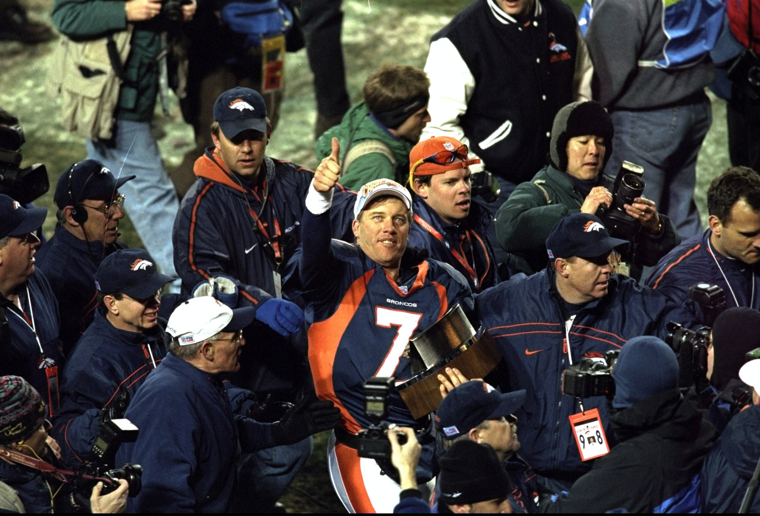 17 Jan 1999: John Elway #7 of the Denver Broncos gives a thumbs up after winning the AFC Championship Game against the New York Jets at Mile High Stadium in Denver, Colorado. The Broncos defeated the Jets 23-10. Mandatory Credit: Tom Hauck /Allsport 17 Jan 1999: John Elway #7 of the Denver Broncos gives a thumbs up after winning the AFC Championship Game against the New York Jets at Mile High Stadium in Denver, Colorado. The Broncos defeated the Jets 23-10. Mandatory Credit: Tom Hauck /Allsport