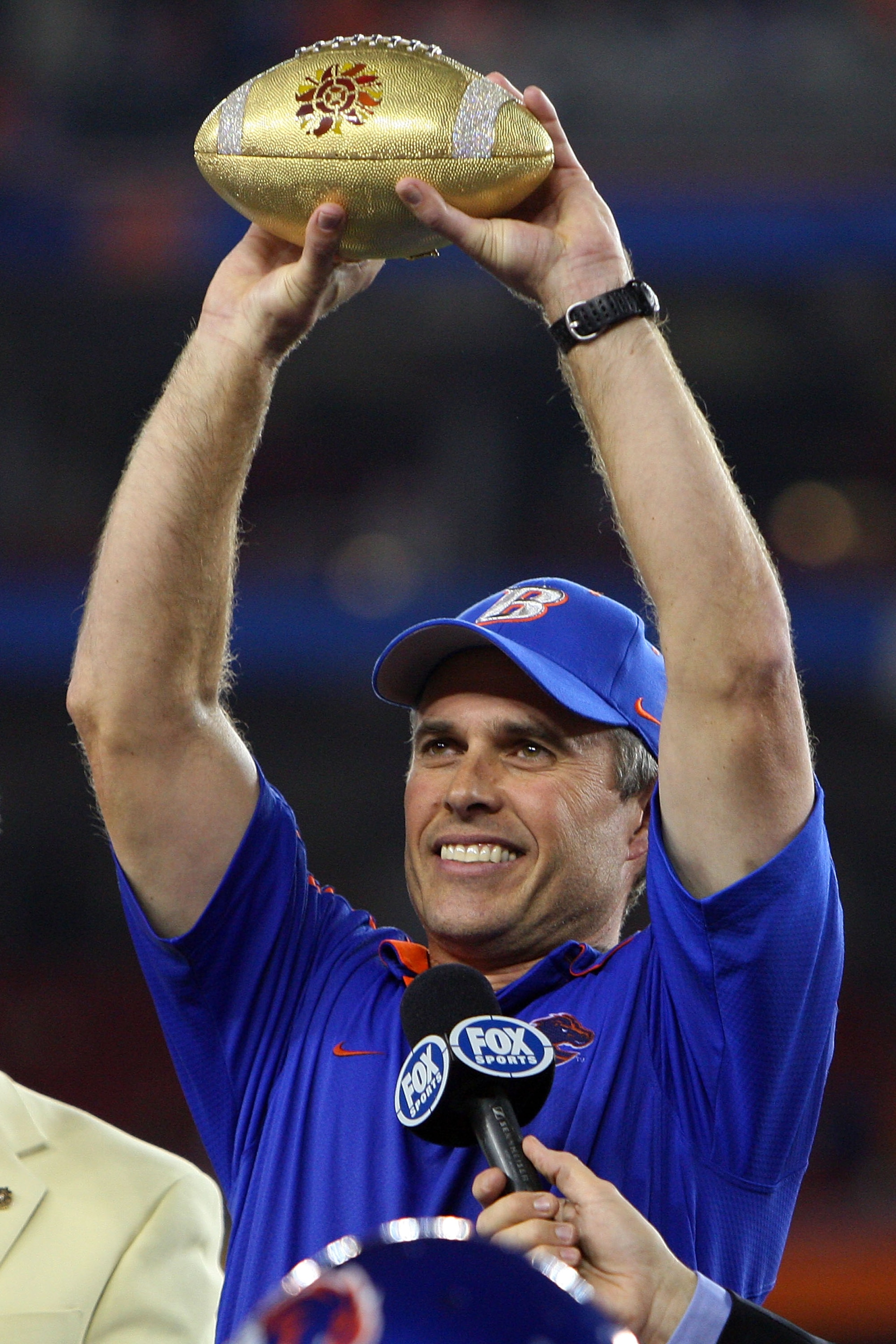 GLENDALE, AZ - JANUARY 04:  Head coach Chris Petersen of the Boise State Broncos celebrates after defeating the TCU Horned Frogs 17-10 during the Tostitos Fiesta Bowl at the Universtity of Phoenix Stadium on January 4, 2010 in Glendale, Arizona.  (Photo b