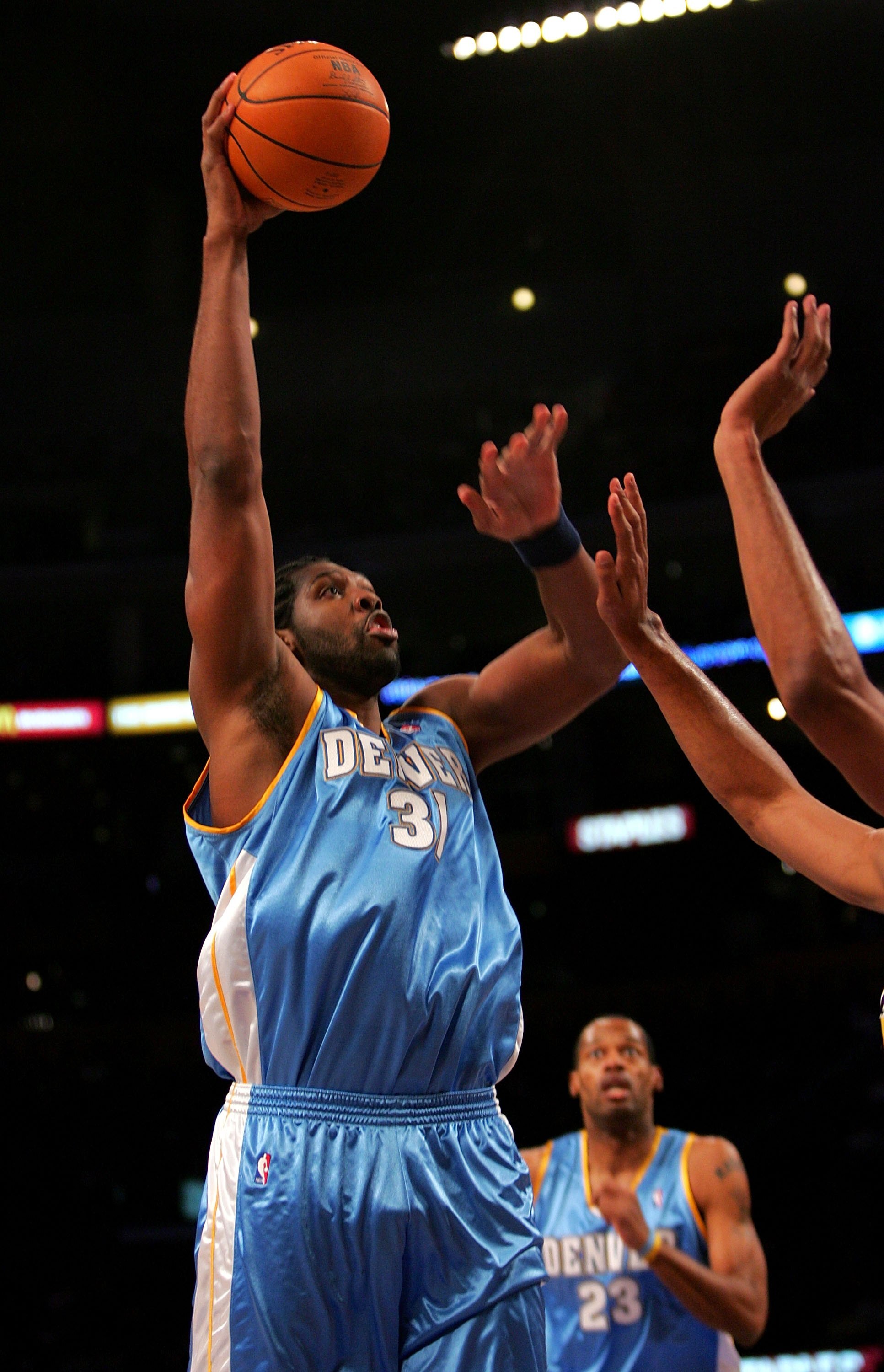 LOS ANGELES - JANUARY 5:  Nene #31 of the Denver Nuggets shoots against the Los Angeles Lakers at Staples Center January 5, 2007 in Los Angeles, California.  NOTE TO USER:  User expressly acknowledges and agrees that, by downloading and or using this phot