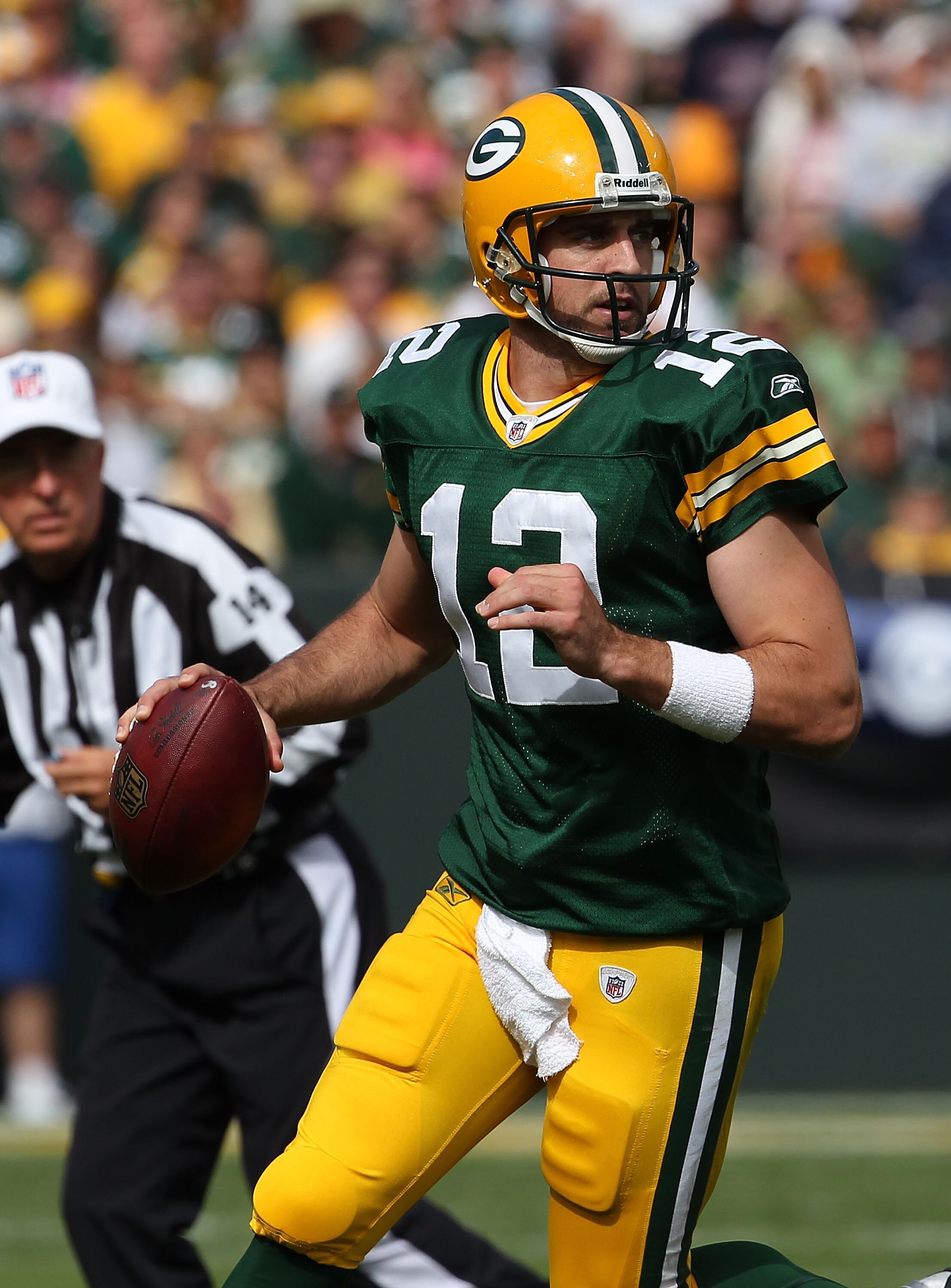 GREEN BAY, WI - SEPTEMBER 19: Aaron Rodgers #12 of the Green Bay Packers looks for a receiver against the Buffalo Bills at Lambeau Field on September 19, 2010 in Green Bay, Wisconsin. The Packers defeated the Bills 34-7. (Photo by Jonathan Daniel/Getty Im GREEN BAY, WI - SEPTEMBER 19: Aaron Rodgers #12 of the Green Bay Packers looks for a receiver against the Buffalo Bills at Lambeau Field on September 19, 2010 in Green Bay, Wisconsin. The Packers defeated the Bills 34-7. (Photo by Jonathan Daniel/Getty Im