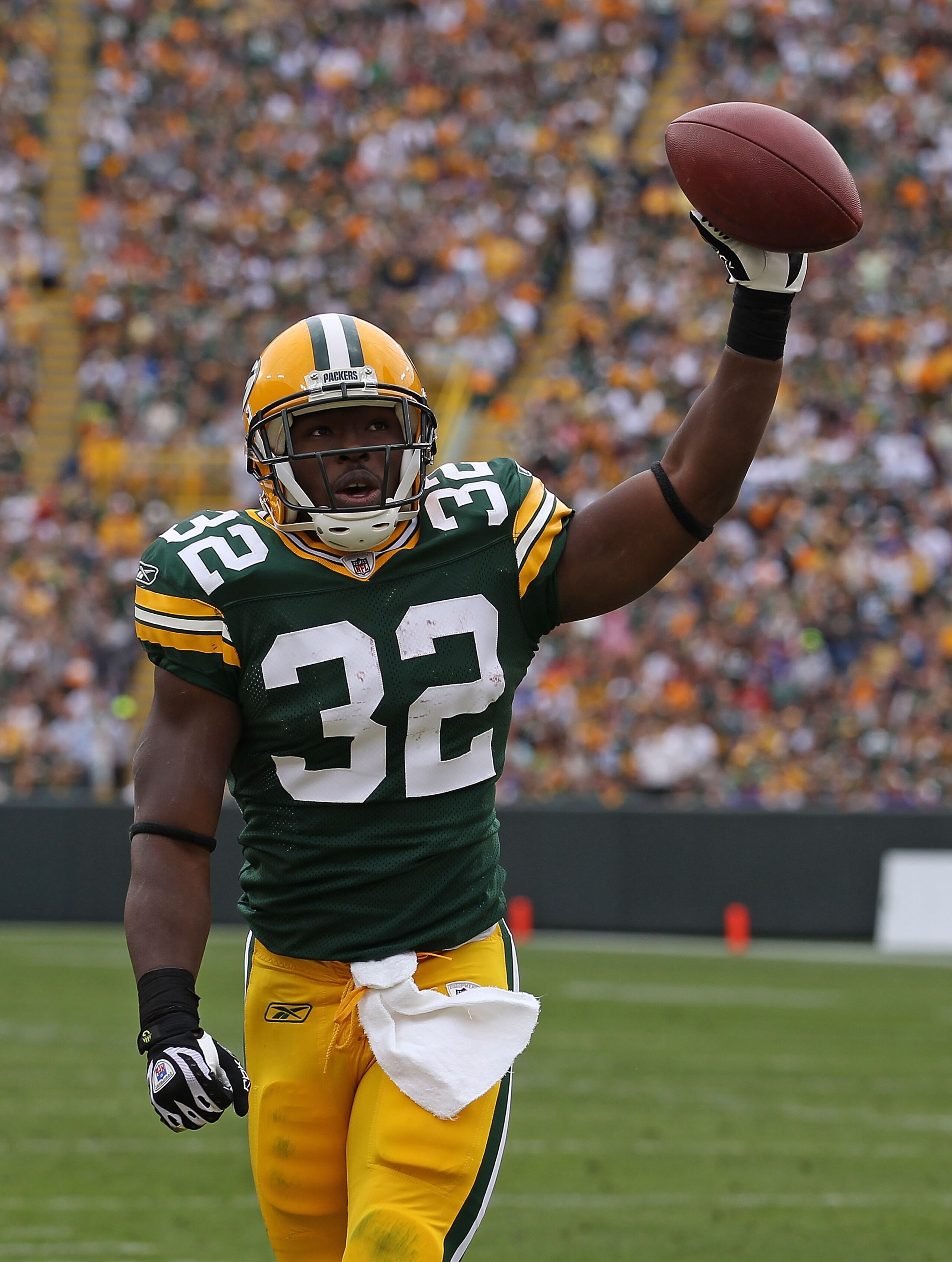 GREEN BAY, WI - SEPTEMBER 19: Brandon Jackson #32 of the Green Bay Packers celebrates a touchdown run against the Buffalo Bills at Lambeau Field on September 19, 2010 in Green Bay, Wisconsin. The Packers defeated the Bills 34-7.  (Photo by Jonathan Daniel