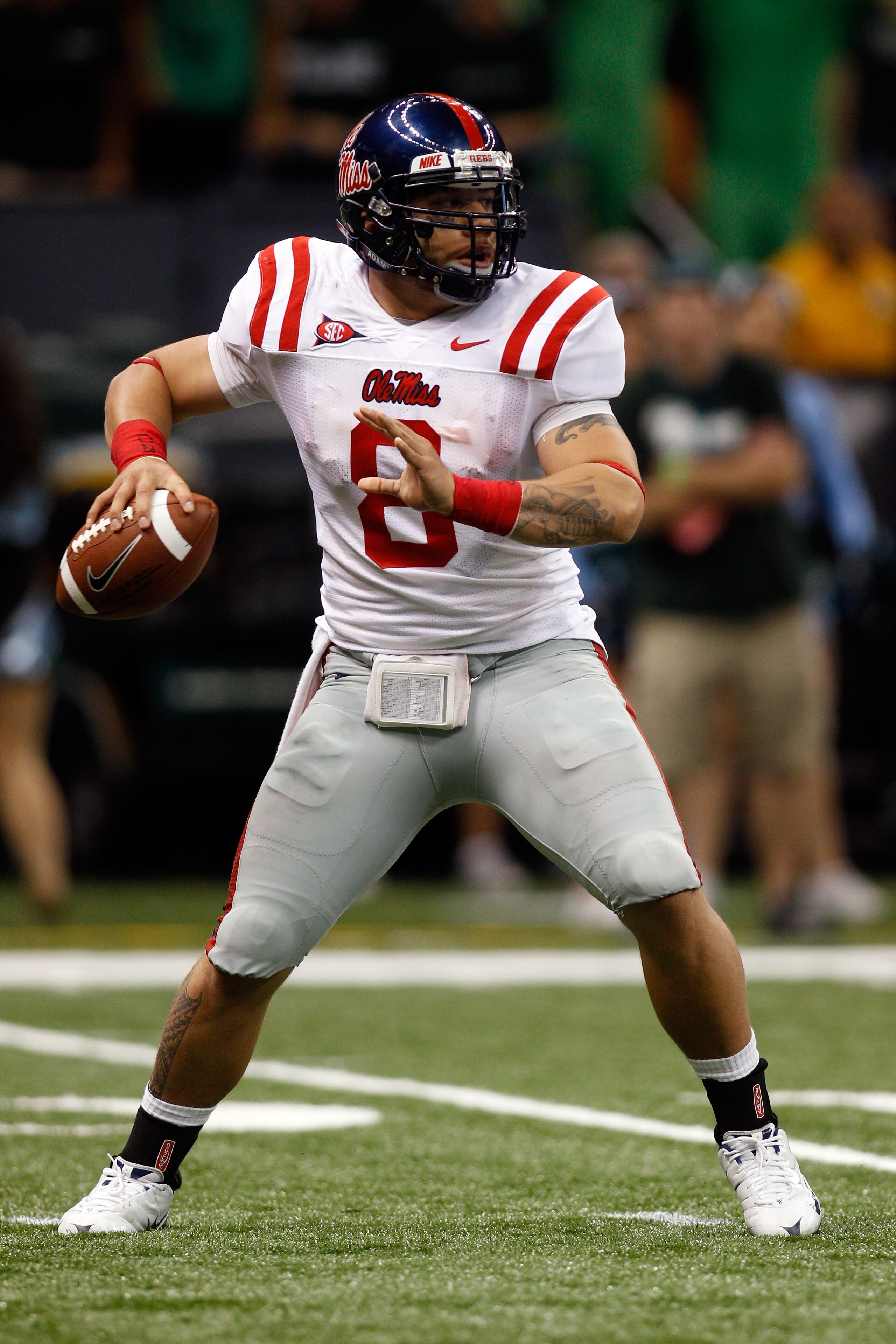 NEW ORLEANS - SEPTEMBER 11:  Jeremiah Masoli #8 of the Ole Miss Rebels in action against the the Tulane Green Wave at the Louisiana Superdome on September 11, 2010 in New Orleans, Louisiana.  Ole Miss defeated Tulane 27-13.  (Photo by Chris Graythen/Getty