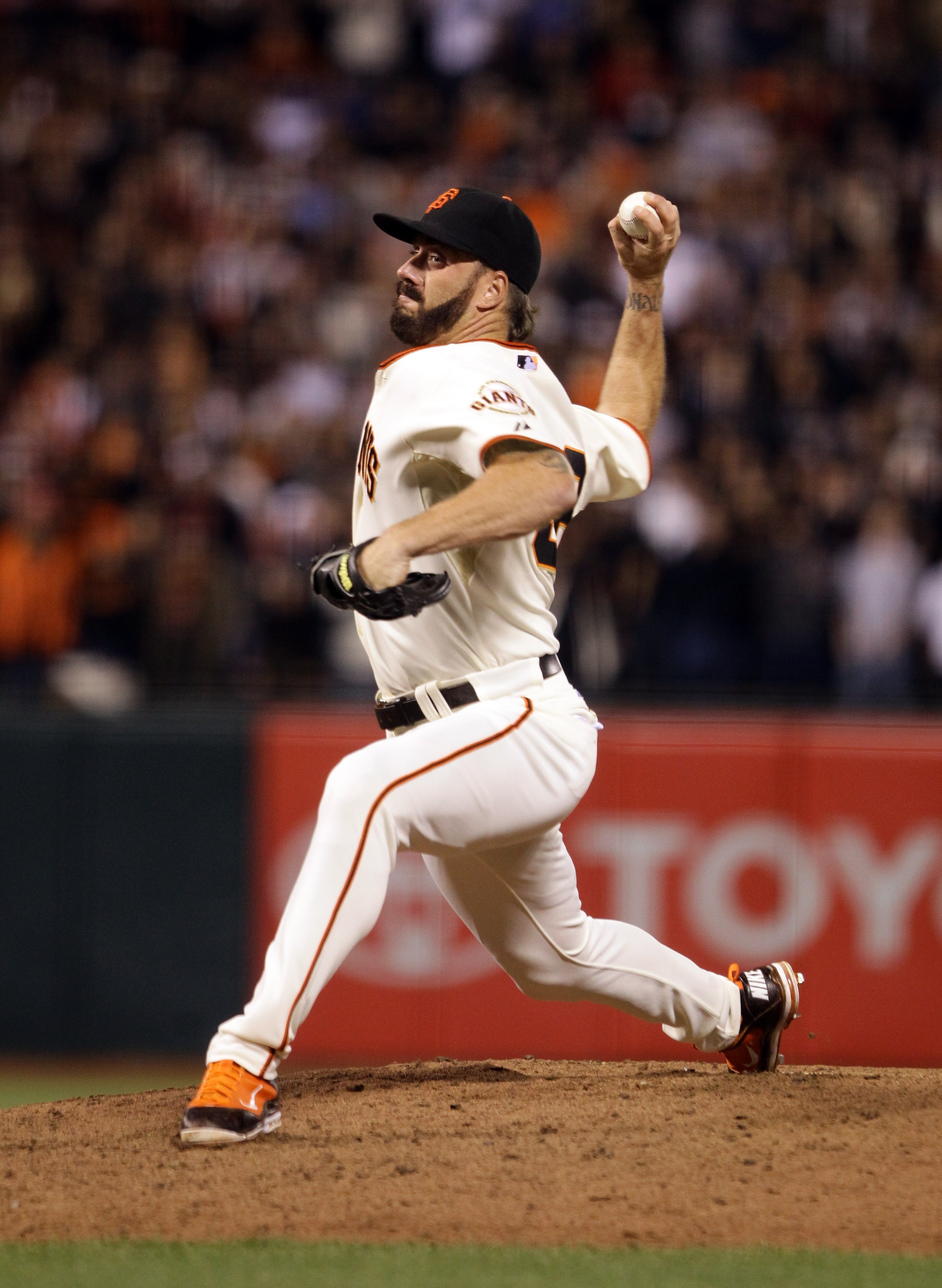 SAN FRANCISCO - SEPTEMBER 15:  Brian Wilson #38 of the San Francisco Giants pitches against the Los Angeles Dodgers at AT&T Park on September 15, 2010 in San Francisco, California.  (Photo by Ezra Shaw/Getty Images)