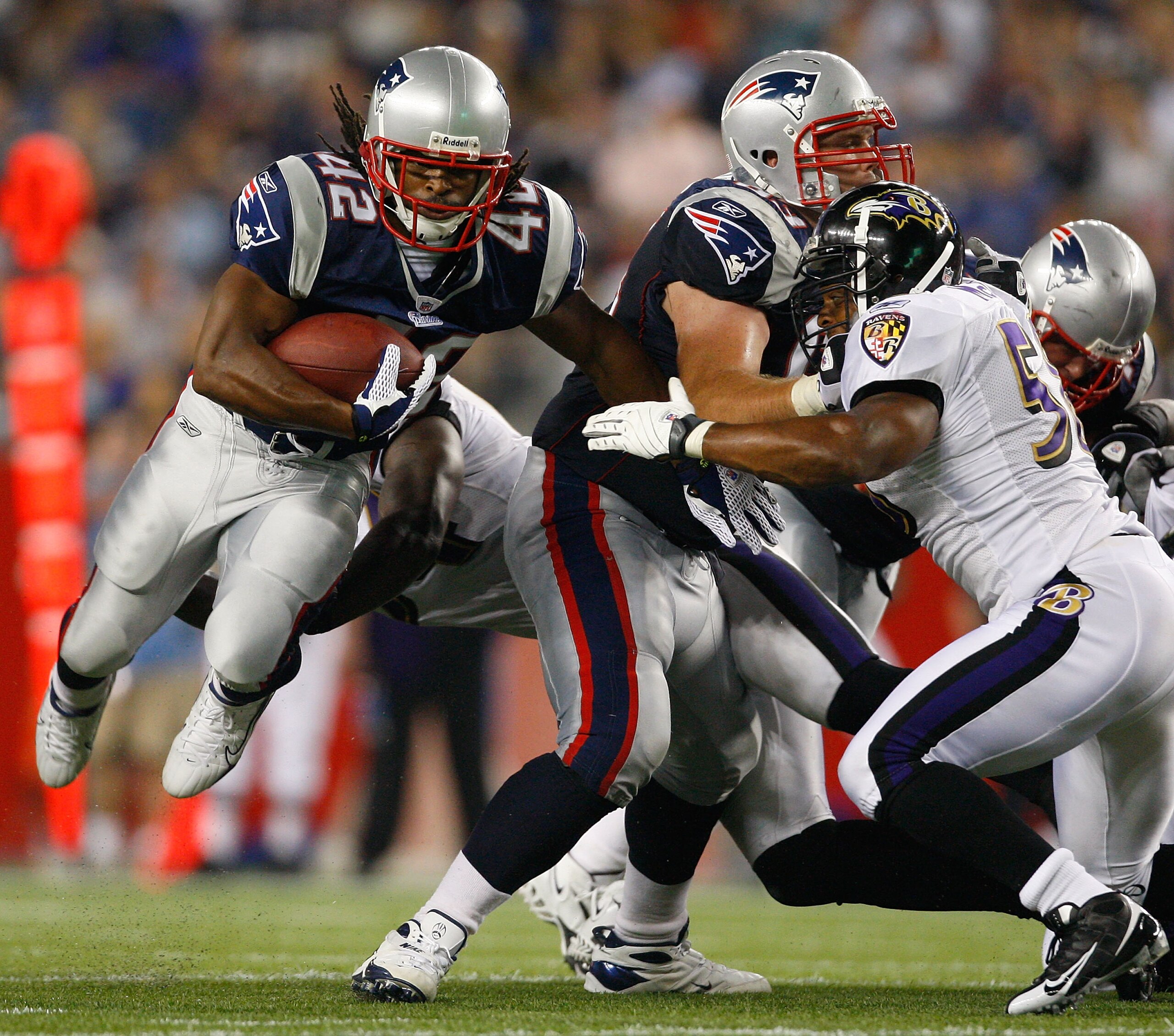 FOXBORO, MA - AUGUST 7: BenJarvis Green-Ellis #42 of the New England Patriots runs the ball against the Baltimore Ravens during a preseason game at Gillette Stadium on August 7, 2008 in Foxboro, Massachusetts. (Photo by Jim Rogash/Getty Images) FOXBORO, MA - AUGUST 7: BenJarvis Green-Ellis #42 of the New England Patriots runs the ball against the Baltimore Ravens during a preseason game at Gillette Stadium on August 7, 2008 in Foxboro, Massachusetts. (Photo by Jim Rogash/Getty Images)