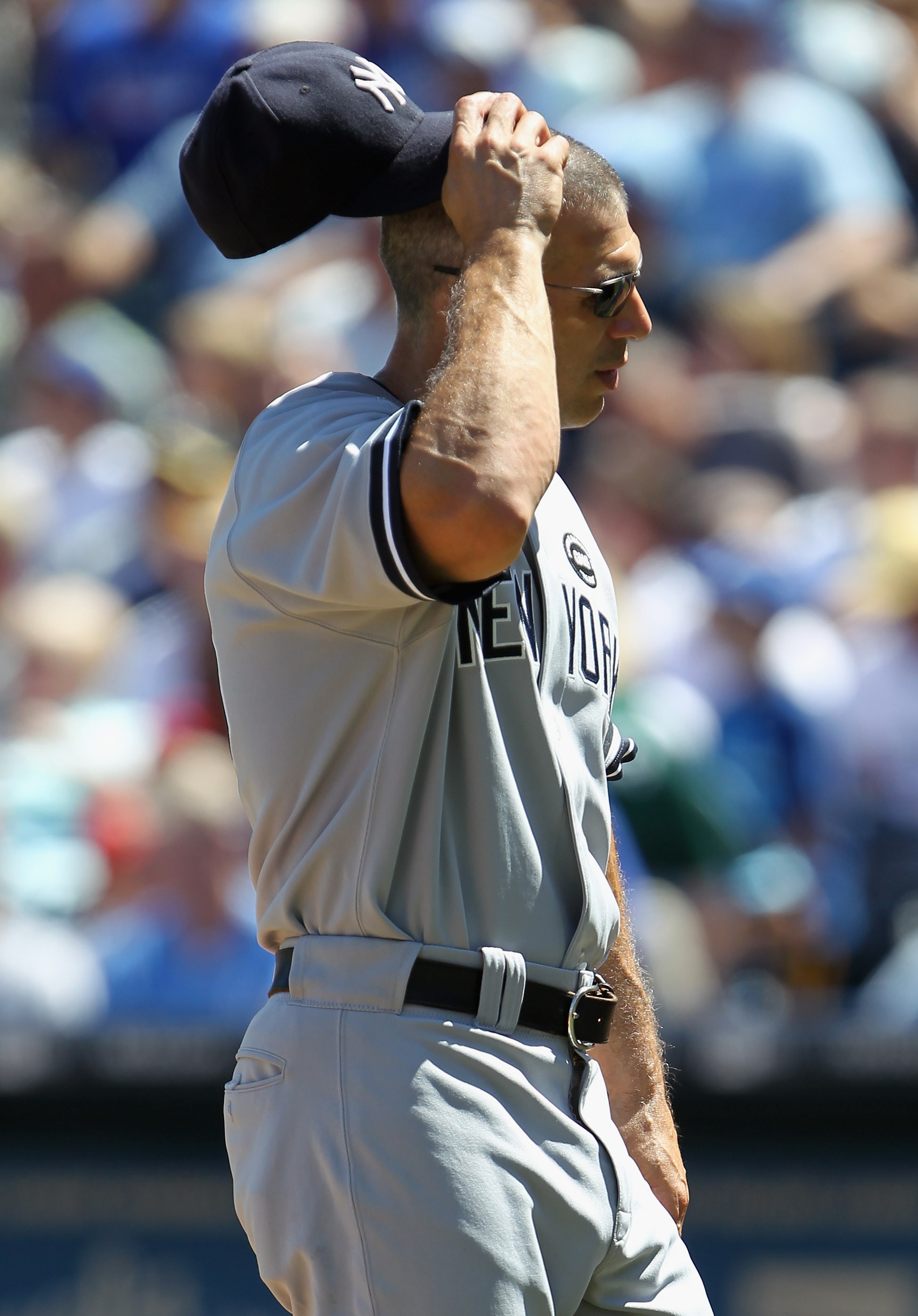 KANSAS CITY, MO - AUGUST 15: Manager Joe Girardi #28 of the New York Yankees walks off the field during the game against the Kansas City Royals on August 15, 2010 at Kauffman stadium in Kansas City, Missouri. (Photo by Jamie Squire/Getty Images) KANSAS CITY, MO - AUGUST 15: Manager Joe Girardi #28 of the New York Yankees walks off the field during the game against the Kansas City Royals on August 15, 2010 at Kauffman stadium in Kansas City, Missouri. (Photo by Jamie Squire/Getty Images)
