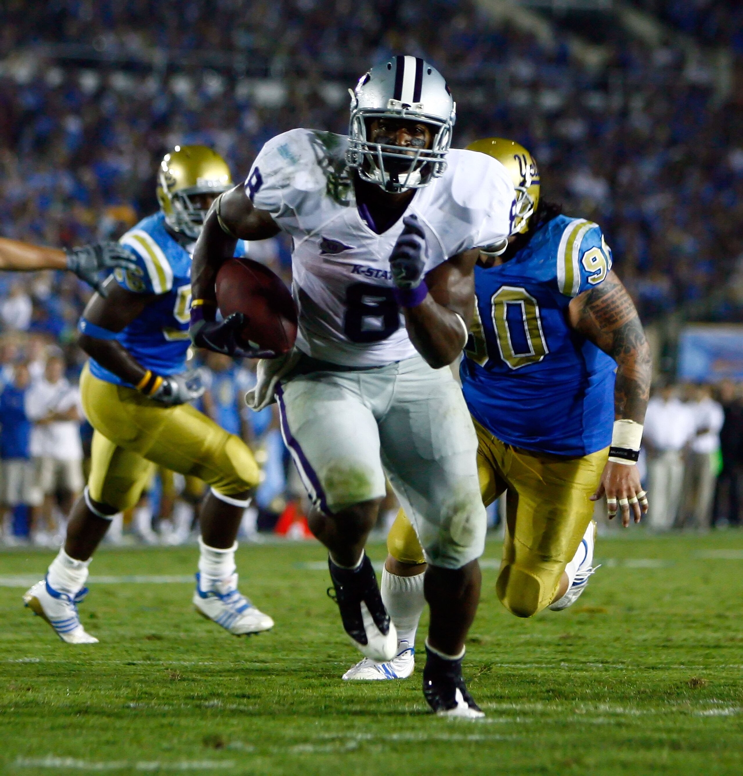 PASADENA, CA - SEPTEMBER 19: Runningback Daniel Thomas #8 of the Kansas State Wildcats carries the ball against the UCLA Bruins at the Rose Bowl on September 19, 2009 in Pasadena, California. UCLA defeated Kansas State 23-9. (Photo by Jeff Gross/Getty I PASADENA, CA - SEPTEMBER 19: Runningback Daniel Thomas #8 of the Kansas State Wildcats carries the ball against the UCLA Bruins at the Rose Bowl on September 19, 2009 in Pasadena, California. UCLA defeated Kansas State 23-9. (Photo by Jeff Gross/Getty I